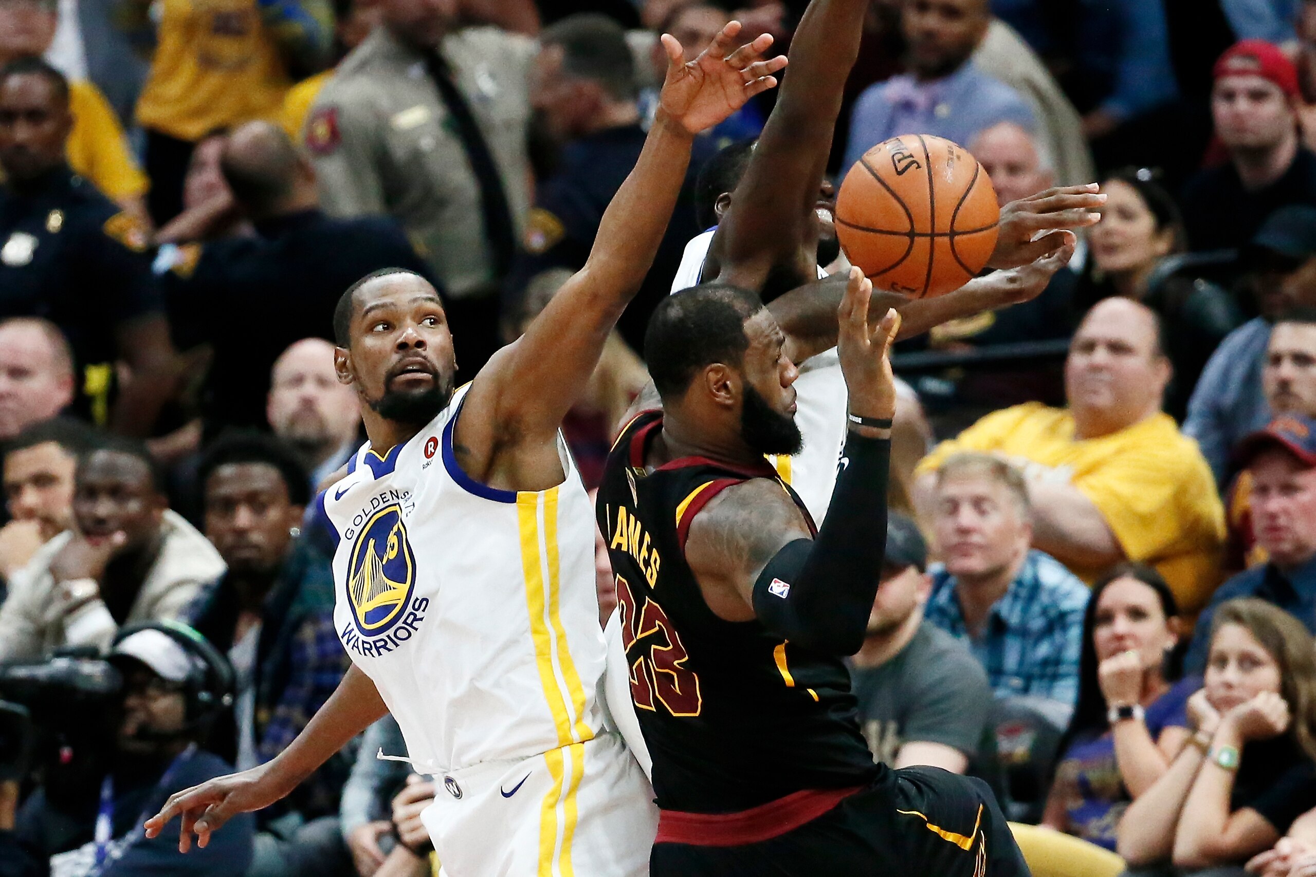 CLEVELAND, CA - JUN 8: LeBron James #23 of the Cleveland Cavaliers passes the ball against Kevin Durant #35 of the Golden State Warriors in Game Four of the 2018 NBA Finals won 108-85 by the Golden State Warriors over the Cleveland Cavaliers at the Quicke