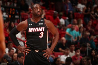 MIAMI, FL - MARCH 31: Dwayne Wade #3 of the Miami Heat looks on during the game against the Brooklyn Nets on March 31st, 2018 at American Airlines Arena in Miami, Florida. NOTE TO USER: User expressly acknowledges and agrees that, by downloading and or us