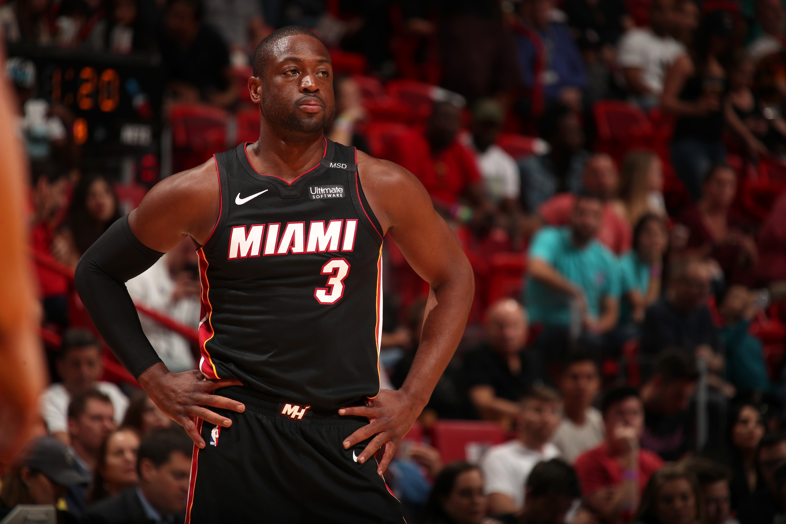 MIAMI, FL - MARCH 31: Dwayne Wade #3 of the Miami Heat looks on during the game against the Brooklyn Nets on March 31st, 2018 at American Airlines Arena in Miami, Florida. NOTE TO USER: User expressly acknowledges and agrees that, by downloading and or us MIAMI, FL - MARCH 31: Dwayne Wade #3 of the Miami Heat looks on during the game against the Brooklyn Nets on March 31st, 2018 at American Airlines Arena in Miami, Florida. NOTE TO USER: User expressly acknowledges and agrees that, by downloading and or us