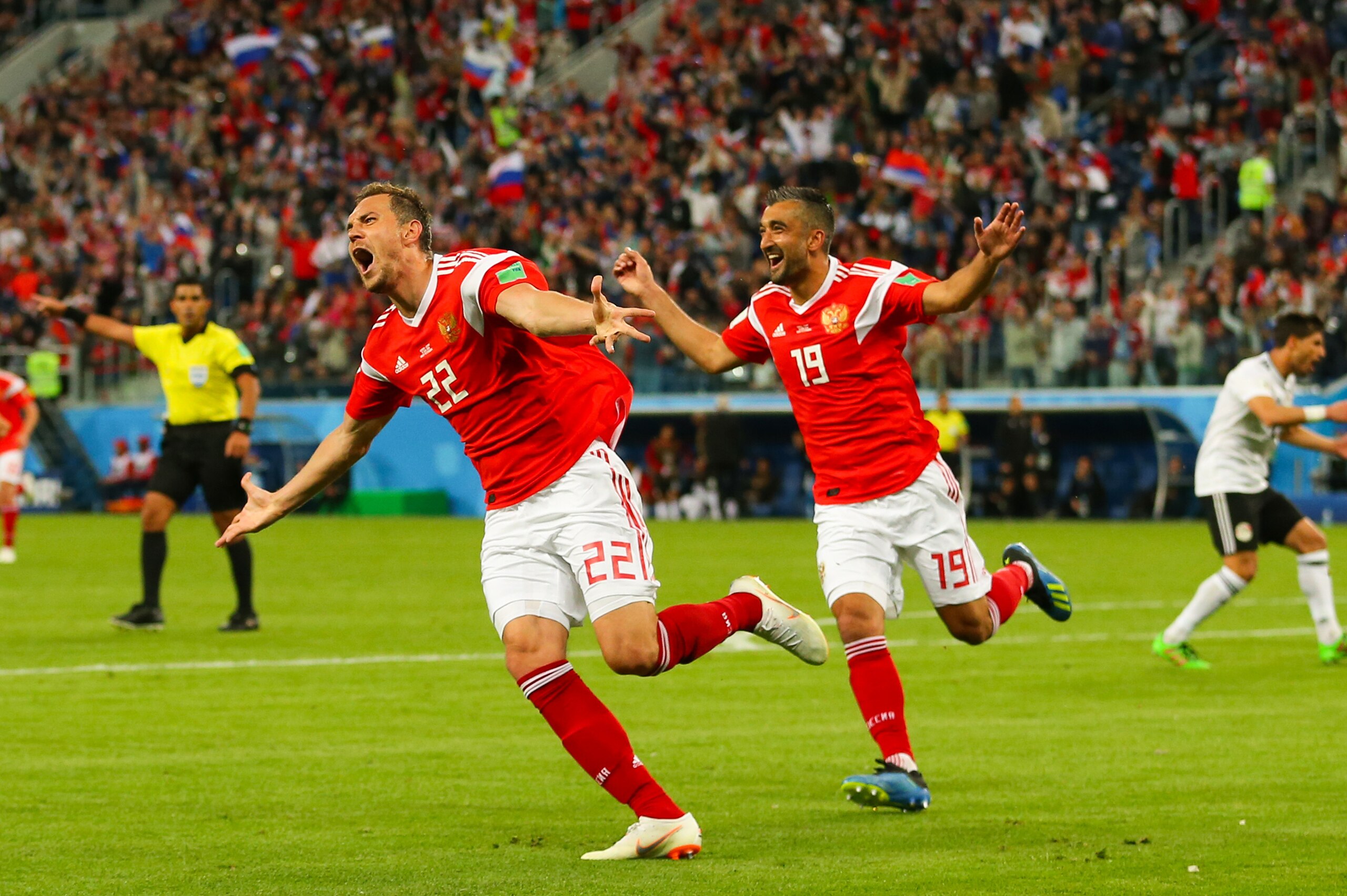 SAINT PETERSBURG, RUSSIA - JUNE 19:   Artem Dzyuba of Russia celebrates scoring a goal to make it 3-0 during the 2018 FIFA World Cup Russia group A match between Russia and Egypt at Saint Petersburg Stadium on June 19, 2018 in Saint Petersburg, Russia. (P