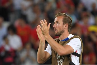 England's forward Harry Kane applauds at the end of the Russia 2018 World Cup Group G football match between England and Belgium at the Kaliningrad Stadium in Kaliningrad on June 28, 2018. (Photo by Patrick HERTZOG / AFP) / RESTRICTED TO EDITORIAL USE - N
