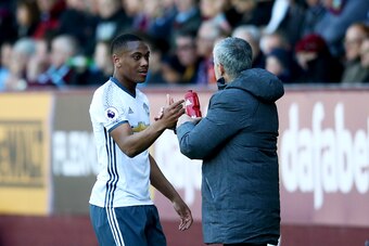 BURNLEY, ENGLAND - APRIL 23:  Jose Mourinho, manager of Manchester United shakes hands with Anthony Martial of Manchester United as he is substituted during the Premier League match between Burnley and Manchester United at Turf Moor on April 23, 2017 in B
