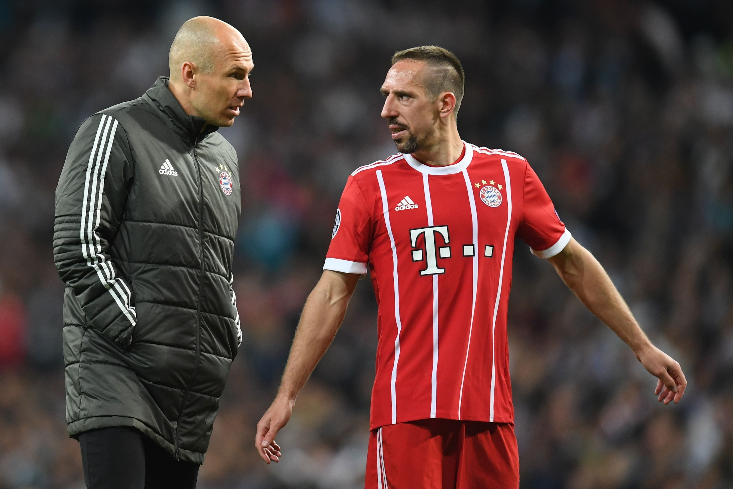 Bayern Munich's Dutch midfielder Arjen Robben (L) and Bayern Munich's French midfielder Franck Ribery react after the UEFA Champions League semi-final second-leg football match Real Madrid CF vs FC Bayern Munich in Madrid, Spain, on May 1, 2018. (Photo by Bayern Munich's Dutch midfielder Arjen Robben (L) and Bayern Munich's French midfielder Franck Ribery react after the UEFA Champions League semi-final second-leg football match Real Madrid CF vs FC Bayern Munich in Madrid, Spain, on May 1, 2018. (Photo by