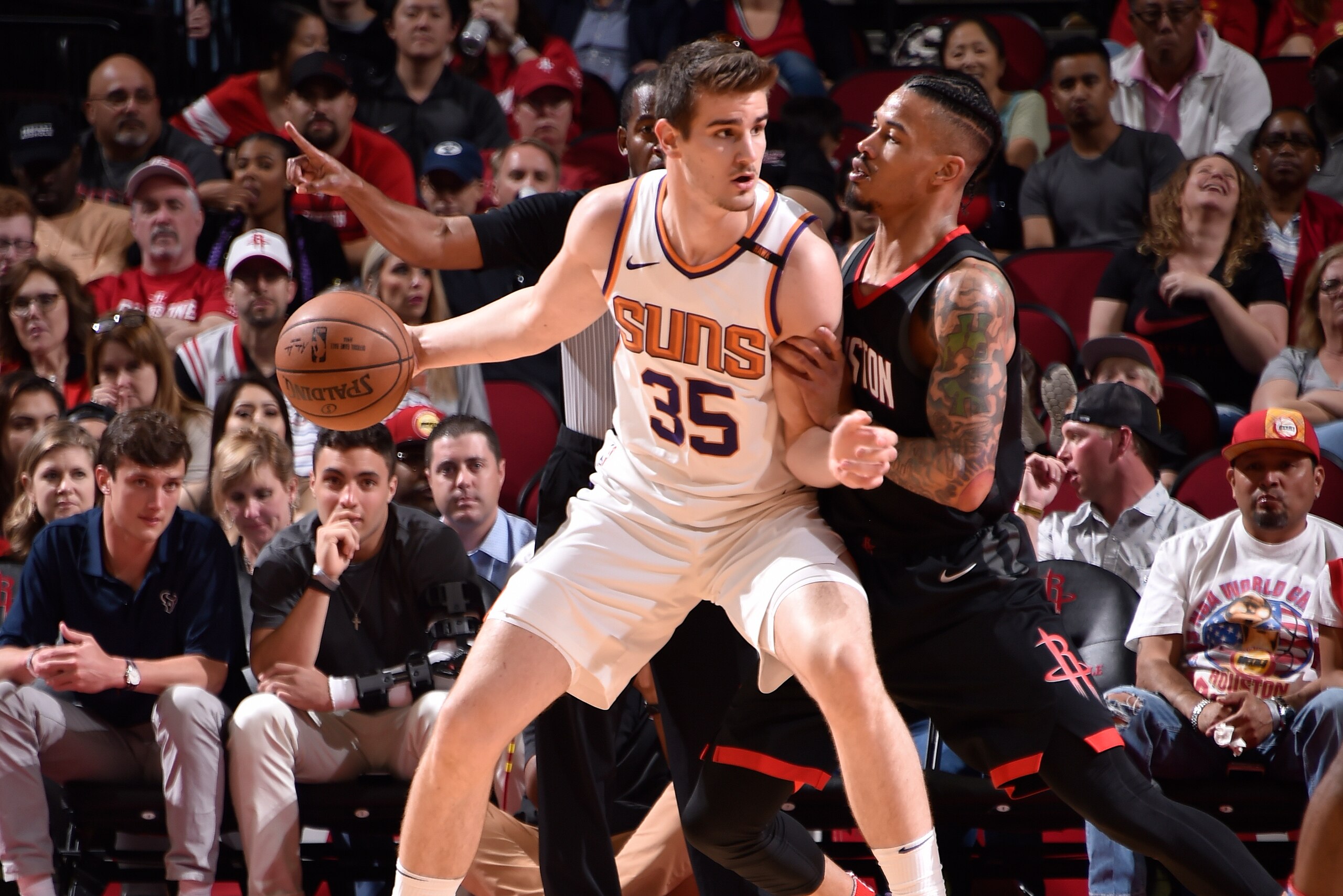 HOUSTON, TX - MARCH 30:  Dragan Bender #35 of the Phoenix Suns handles the ball against Gerald Green #14 of the Houston Rockets on March 30, 2018 at the Toyota Center in Houston, Texas. NOTE TO USER: User expressly acknowledges and agrees that, by downloa