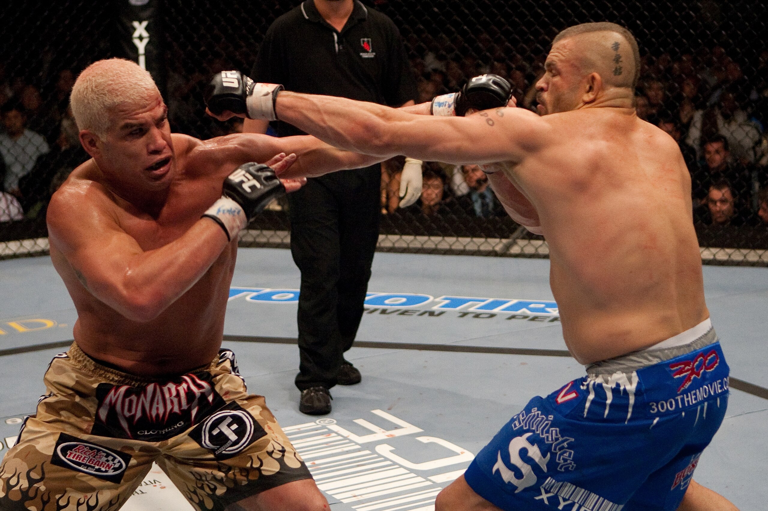 LAS VEGAS - DECEMBER 30:  (L-R) Tito Ortiz and Chuck Liddell exchange punches at  UFC 66 at the MGM Grand Garden Arena on December 30, 2006 in Las Vegas, Nevada.  (Photo by Josh Hedges/Zuffa LLC/Zuffa LLC via Getty Images)
