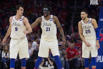 PHILADELPHIA, PA - MAY 7: Dario Saric #9, Joel Embiid #21, and Ben Simmons #25 of the Philadelphia 76ers look on against the Boston Celtics during Game Four of the Eastern Conference Second Round of the 2018 NBA Playoff at Wells Fargo Center on May 7, 201
