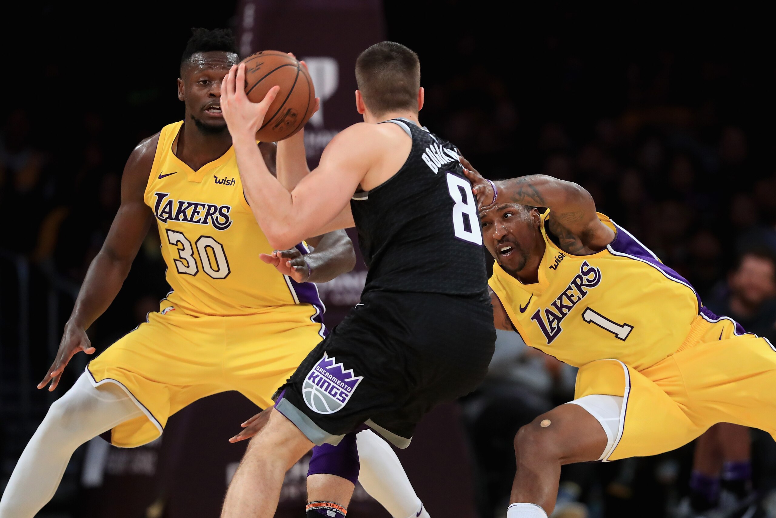 LOS ANGELES, CA - JANUARY 09: Julius Randle #30 and Kentavious Caldwell-Pope #1 of the Los Angeles Lakers defend against Bogdan Bogdanovic #8 of the Sacramento Kings during the second half of a game at Staples Center on January 9, 2018 in Los Angeles, Ca LOS ANGELES, CA - JANUARY 09: Julius Randle #30 and Kentavious Caldwell-Pope #1 of the Los Angeles Lakers defend against Bogdan Bogdanovic #8 of the Sacramento Kings during the second half of a game at Staples Center on January 9, 2018 in Los Angeles, Ca