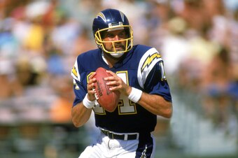 SAN DIEGO -1987: Dan Fouts #14 of the San Diego Chargers looks to pass during a 1987 NFL season game at Jack Murphy Stadium in San Diego, California. ( Photo by: Stephen Dunn/Getty Images)