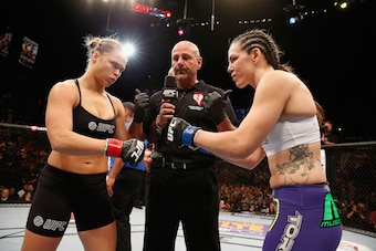LAS VEGAS, NV - JULY 05:  (L-R) UFC women's bantamweight champion Ronda Rousey and Alexis Davis touch gloves before their UFC women's bantamweight championship fight at UFC 175 inside the Mandalay Bay Events Center on July 5, 2014 in Las Vegas, Nevada.  (