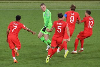 MOSCOW, RUSSIA - JULY 03:  Jordan Pickford of England is congratulated by Jesse Lingard, John Stones, Harry Kane and Kieran Trippier after victory during the 2018 FIFA World Cup Russia Round of 16 match between Colombia and England at Spartak Stadium on J