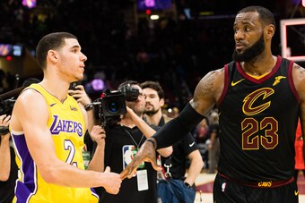 CLEVELAND, OH - DECEMBER 14: Lonzo Ball #2 of the Los Angeles Lakers shakes hands with LeBron James #23 of the Cleveland Cavaliers after the game at Quicken Loans Arena on December 14, 2017 in Cleveland, Ohio. The Cavaliers defeated the Lakers 121-112. NO