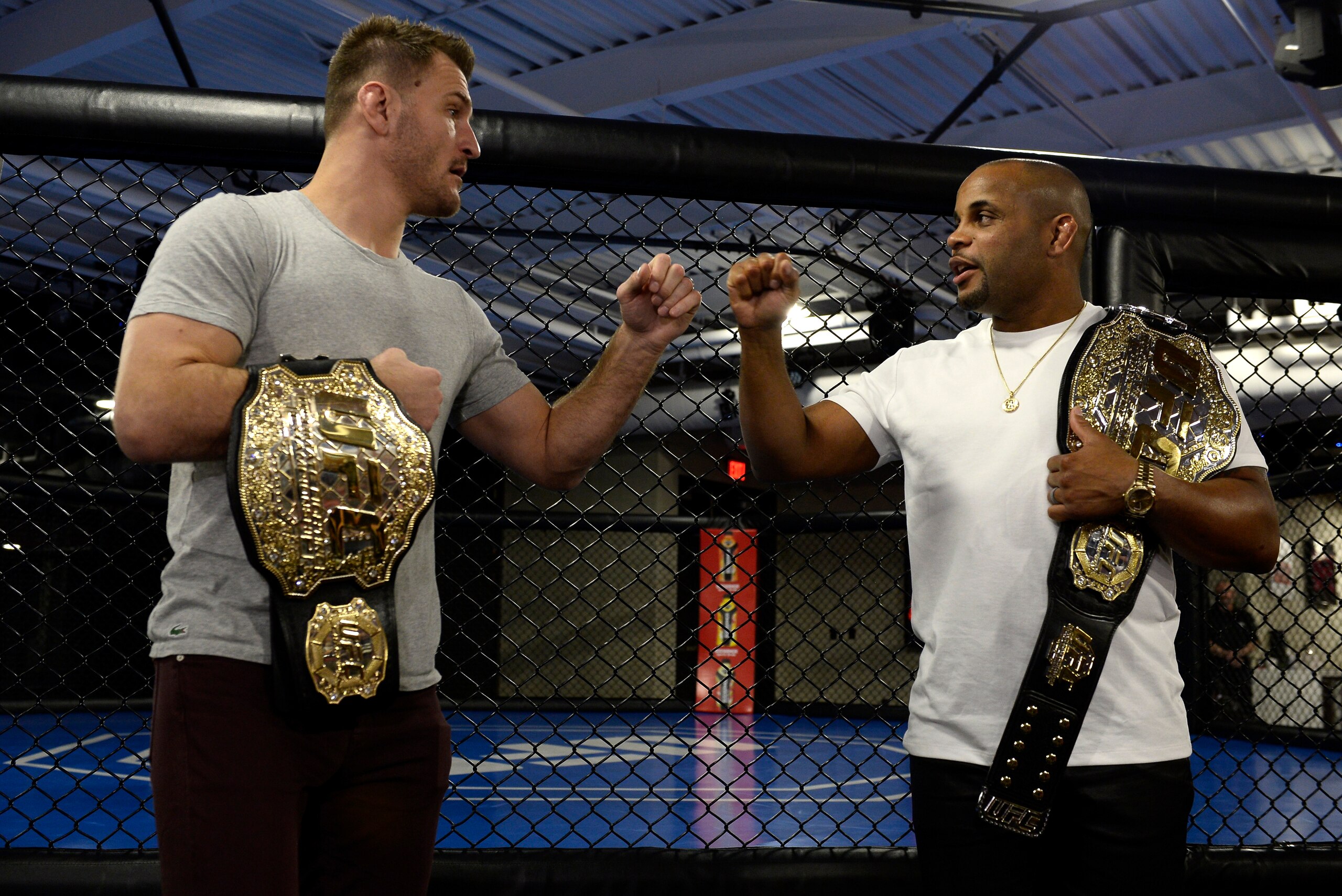 LAS VEGAS, NV - FEBRUARY 02:  (L-R) Stipe Miocic and Daniel Cormier bump fists during the The Ultimate Fighter: Undefeated Cast & Coaches Media Day inside the UFC Performance institute on February 2, 2017 in Las Vegas, Nevada. (Photo by Brandon Magnus/Zuf