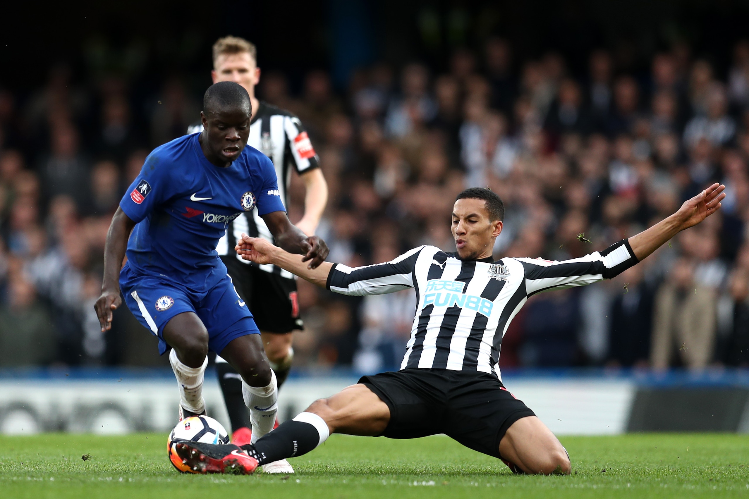 LONDON, ENGLAND - JANUARY 28:  Isaac Hayden of Newcastle United tackles N'Golo Kante of Chelsea during The Emirates FA Cup Fourth Round match between Chelsea and Newcastle on January 28, 2018 in London, United Kingdom.  (Photo by Catherine Ivill/Getty Ima