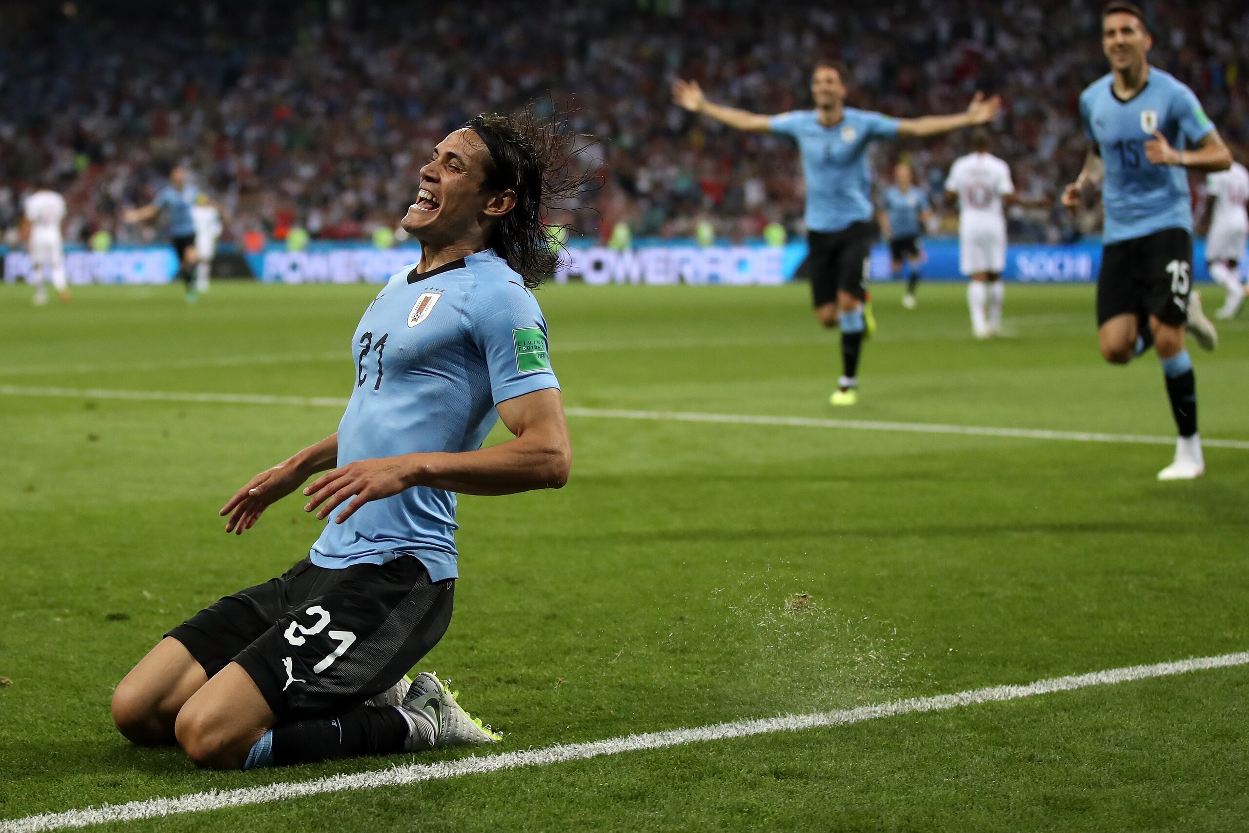 SOCHI, RUSSIA - JUNE 30:  Edinson Cavani of Uruguay celebrates scoring his first goal during the 2018 FIFA World Cup Russia Round of 16 match between Uruguay and Portugal at Fisht Stadium on June 30, 2018 in Sochi, Russia.  (Photo by Julian Finney/Getty I