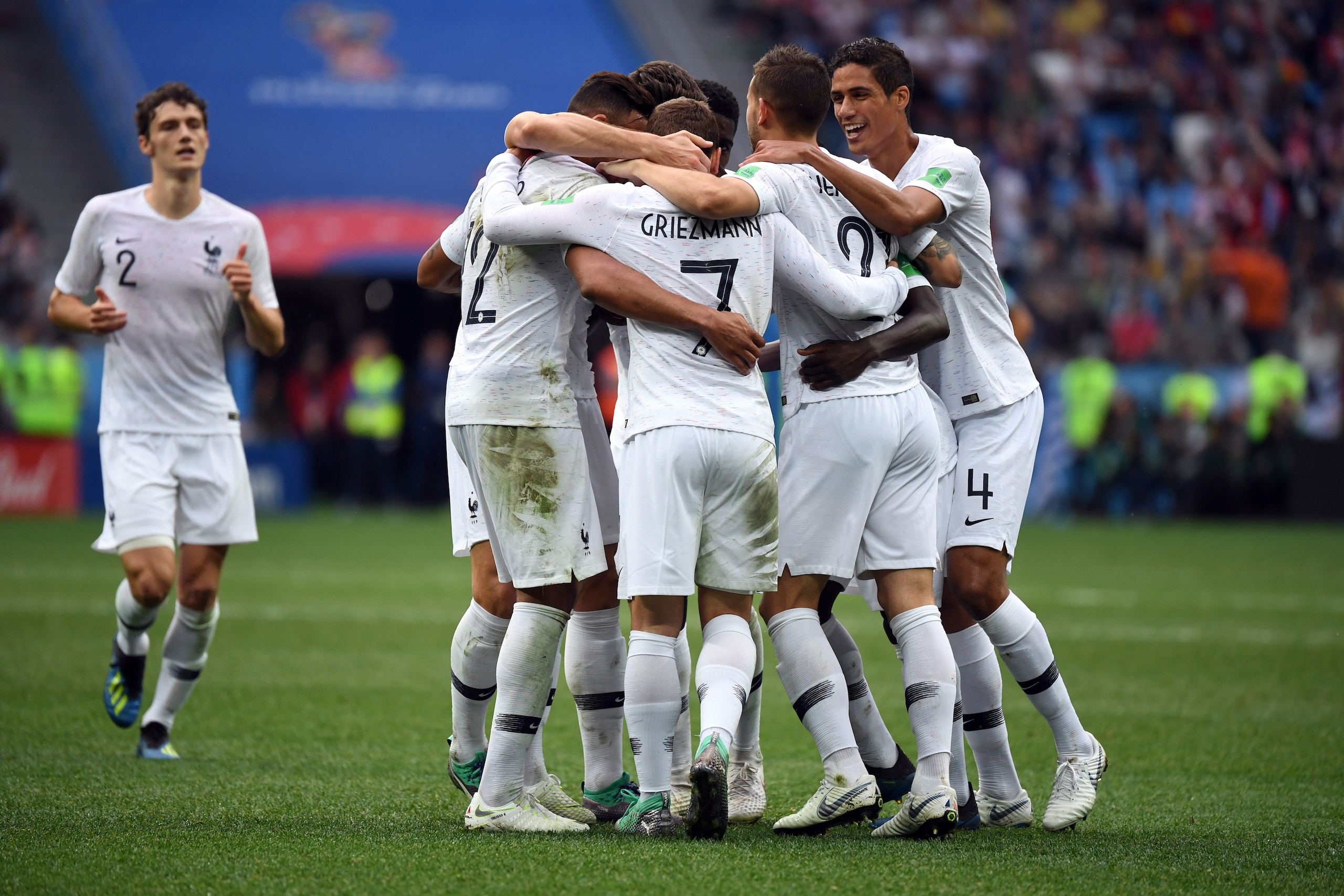 France's players celebrate after scoring their second goal during the Russia 2018 World Cup quarter-final football match between Uruguay and France at the Nizhny Novgorod Stadium in Nizhny Novgorod on July 6, 2018. (Photo by Kirill KUDRYAVTSEV / AFP) / RE