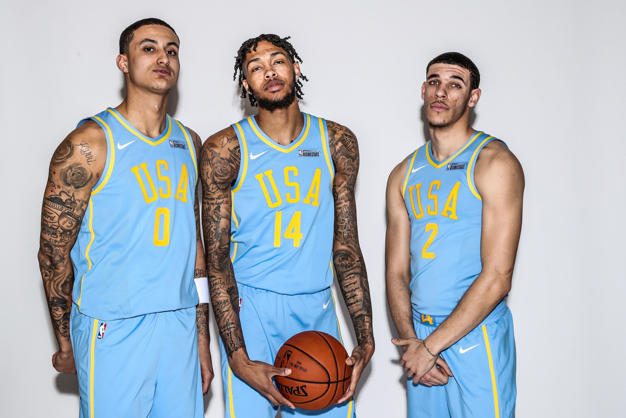 LOS ANGELES, CA - FEBRUARY 16: Kyle Kuzma #0 Brandon Ingram #14 and Lonzo Ball #2 of the USA team  pose for a portrait prior to the Mountain Dew Kickstart Rising Stars Game during All-Star Friday Night as part of 2018 NBA All-Star Weekend at the STAPLES C