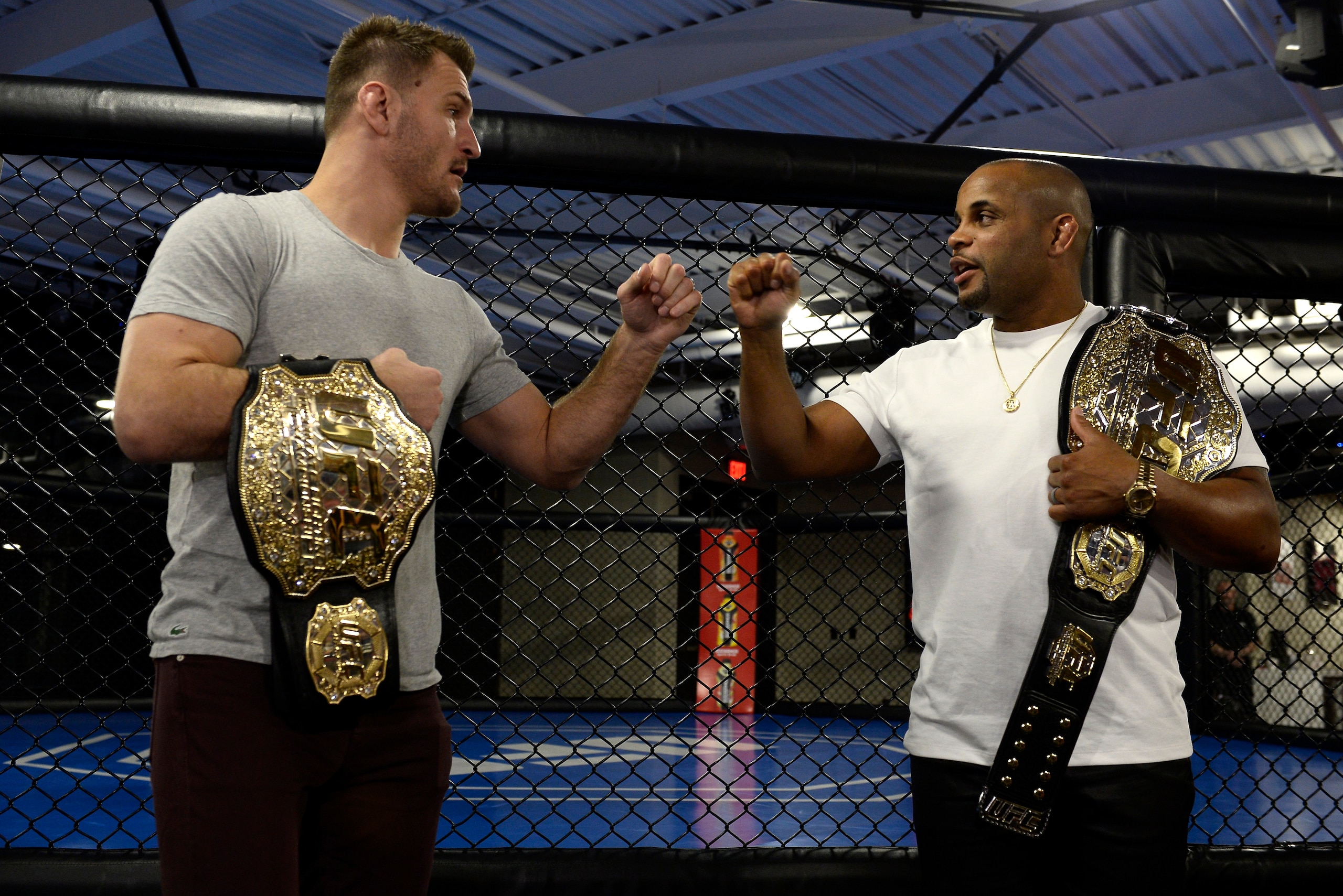 LAS VEGAS, NV - FEBRUARY 02:  (L-R) Stipe Miocic and Daniel Cormier bump fists during the The Ultimate Fighter: Undefeated Cast & Coaches Media Day inside the UFC Performance institute on February 2, 2017 in Las Vegas, Nevada. (Photo by Brandon Magnus/Zuf