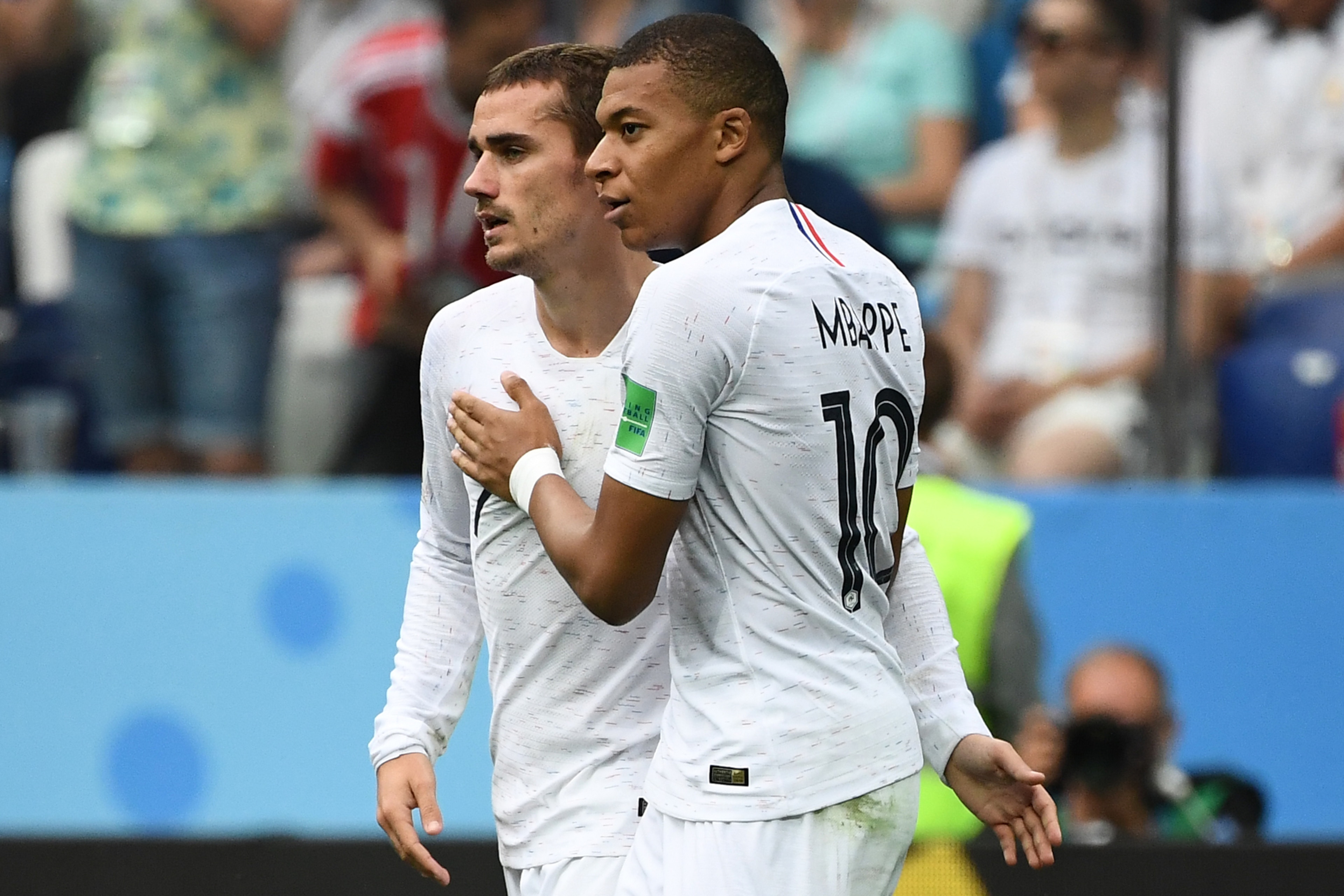 France's forward Antoine Griezmann (L) celebrates scoring his team's second goal with France's forward Kylian Mbappe during the Russia 2018 World Cup quarter-final football match between Uruguay and France at the Nizhny Novgorod Stadium in Nizhny Novgorod
