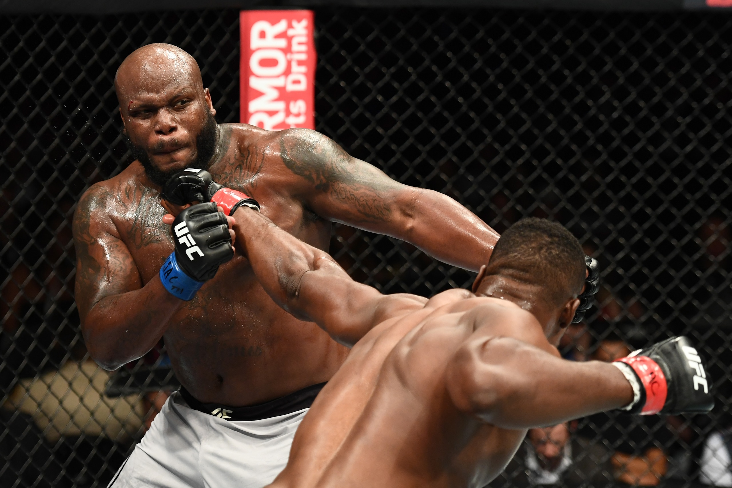 LAS VEGAS, NV - JULY 07:  Francis Ngannou of Cameroon punches Derrick Lewis in their heavyweight fight during the UFC 226 event inside T-Mobile Arena on July 7, 2018 in Las Vegas, Nevada.  (Photo by Josh Hedges/Zuffa LLC/Zuffa LLC via Getty Images)