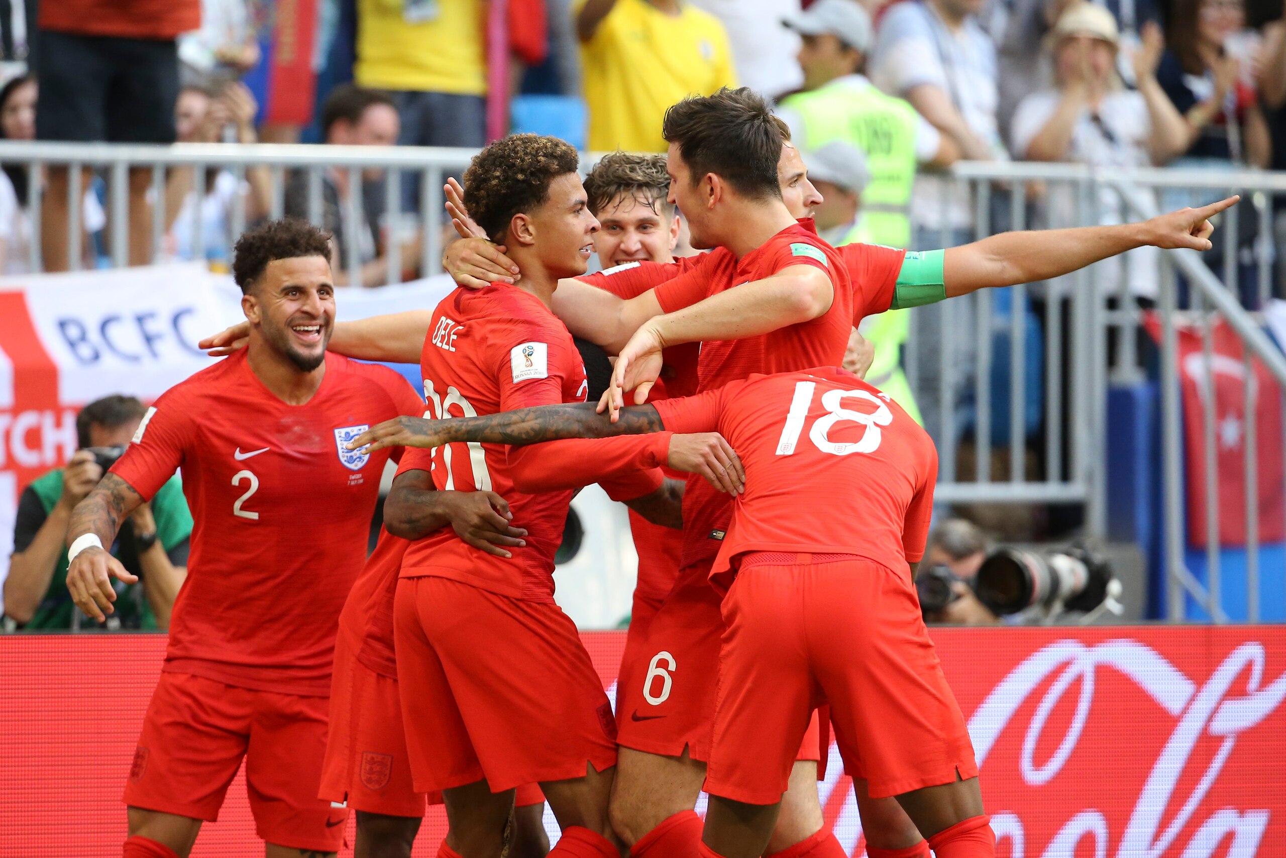 SAMARA, RUSSIA - JULY 7: Dele Alli of England celebrates his goal with Kyle Walker, John Stones, Harry Maguire during the 2018 FIFA World Cup Russia Quarter Final match between Sweden and England at Samara Arena on July 7, 2018 in Samara, Russia. (Photo b