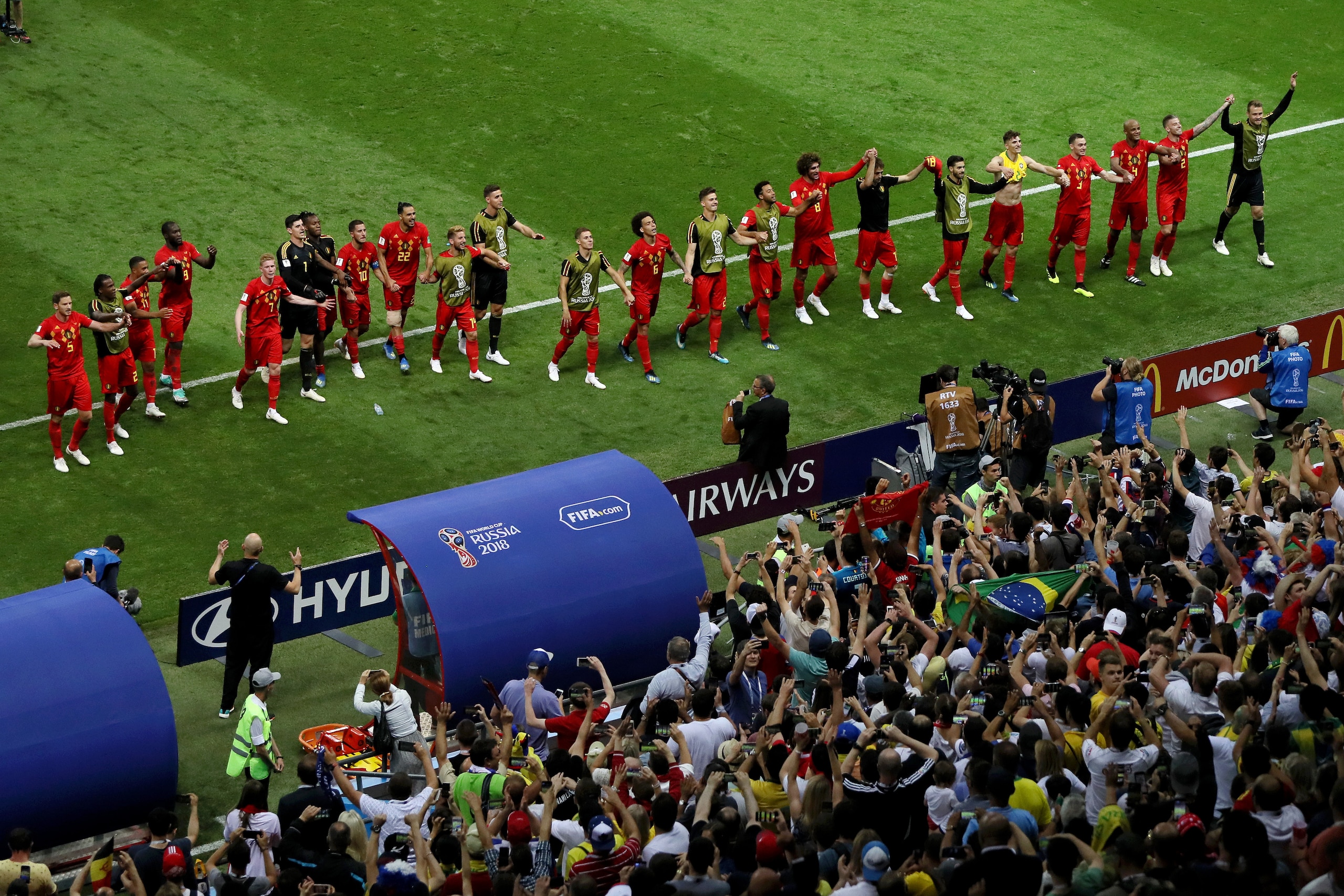 KAZAN, RUSSIA - JULY 06: Belgium players celebrate with their fans following their sides victory in the 2018 FIFA World Cup Russia Quarter Final match between Brazil and Belgium at Kazan Arena on July 6, 2018 in Kazan, Russia. (Photo by Kevin C. Cox/Get KAZAN, RUSSIA - JULY 06: Belgium players celebrate with their fans following their sides victory in the 2018 FIFA World Cup Russia Quarter Final match between Brazil and Belgium at Kazan Arena on July 6, 2018 in Kazan, Russia. (Photo by Kevin C. Cox/Get