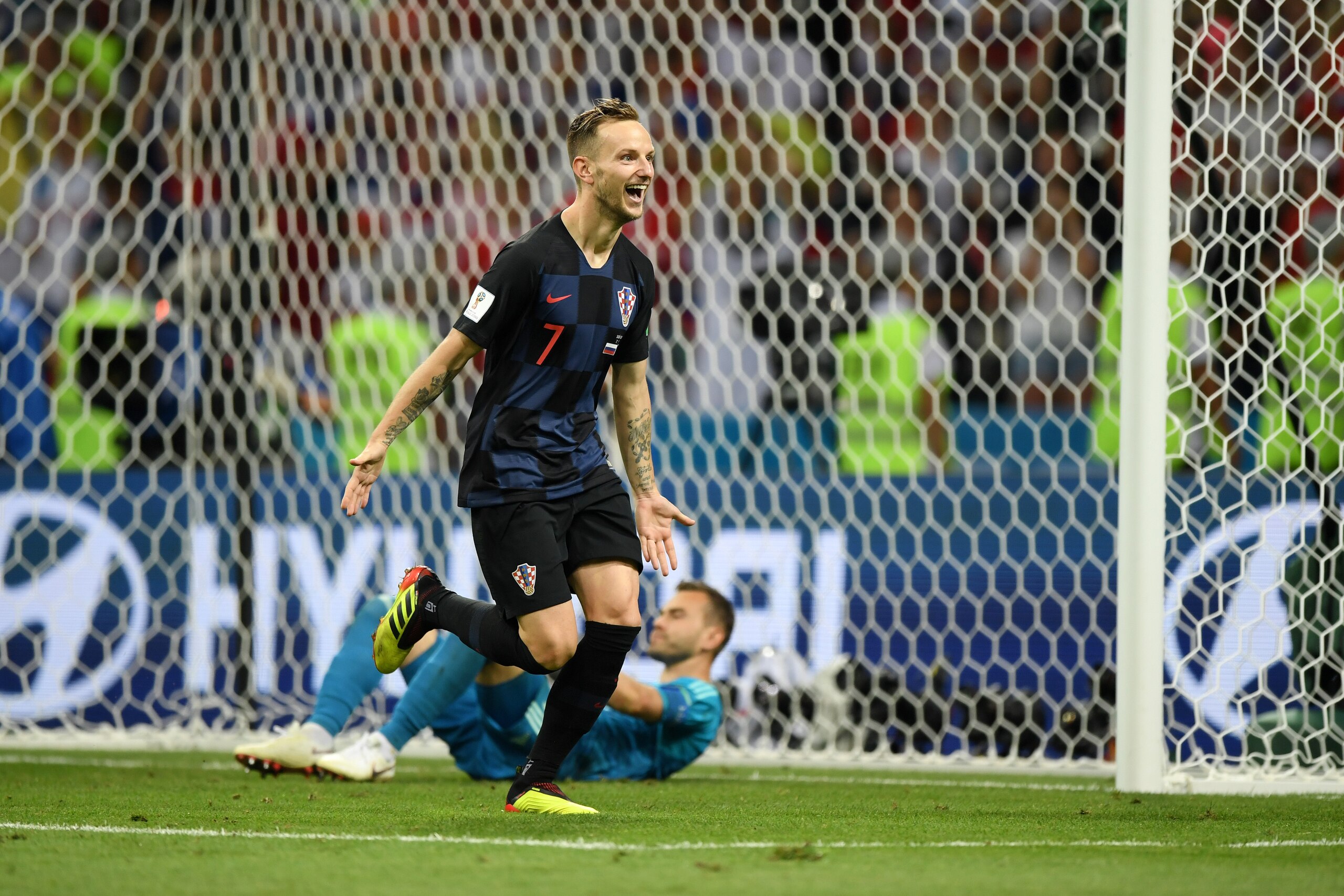SOCHI, RUSSIA - JULY 07: Ivan Rakitic of Croatia scores his sides winning penalty in the penalty shoot out during the 2018 FIFA World Cup Russia Quarter Final match between Russia and Croatia at Fisht Stadium on July 7, 2018 in Sochi, Russia. (Photo by SOCHI, RUSSIA - JULY 07: Ivan Rakitic of Croatia scores his sides winning penalty in the penalty shoot out during the 2018 FIFA World Cup Russia Quarter Final match between Russia and Croatia at Fisht Stadium on July 7, 2018 in Sochi, Russia. (Photo by