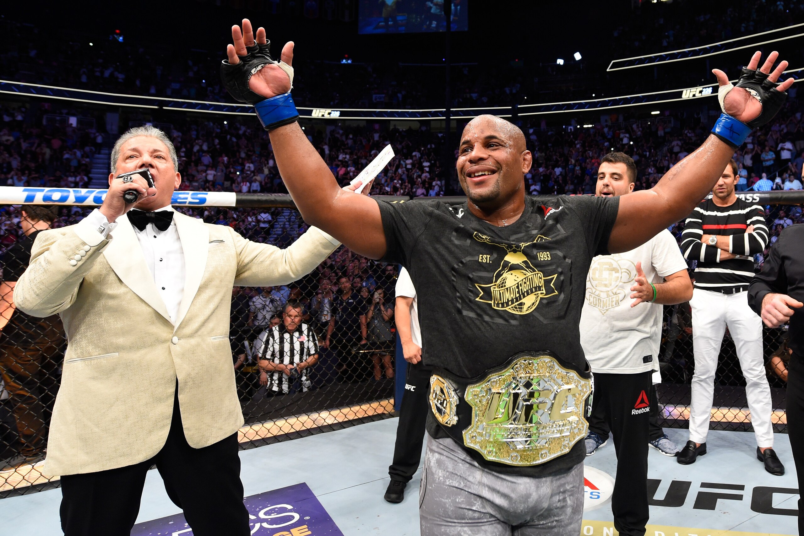 LAS VEGAS, NV - JULY 07:  Daniel Cormier celebrates his victory over Stipe Miocic in their UFC heavyweight championship fight during the UFC 226 event inside T-Mobile Arena on July 7, 2018 in Las Vegas, Nevada.  (Photo by Josh Hedges/Zuffa LLC/Zuffa LLC v