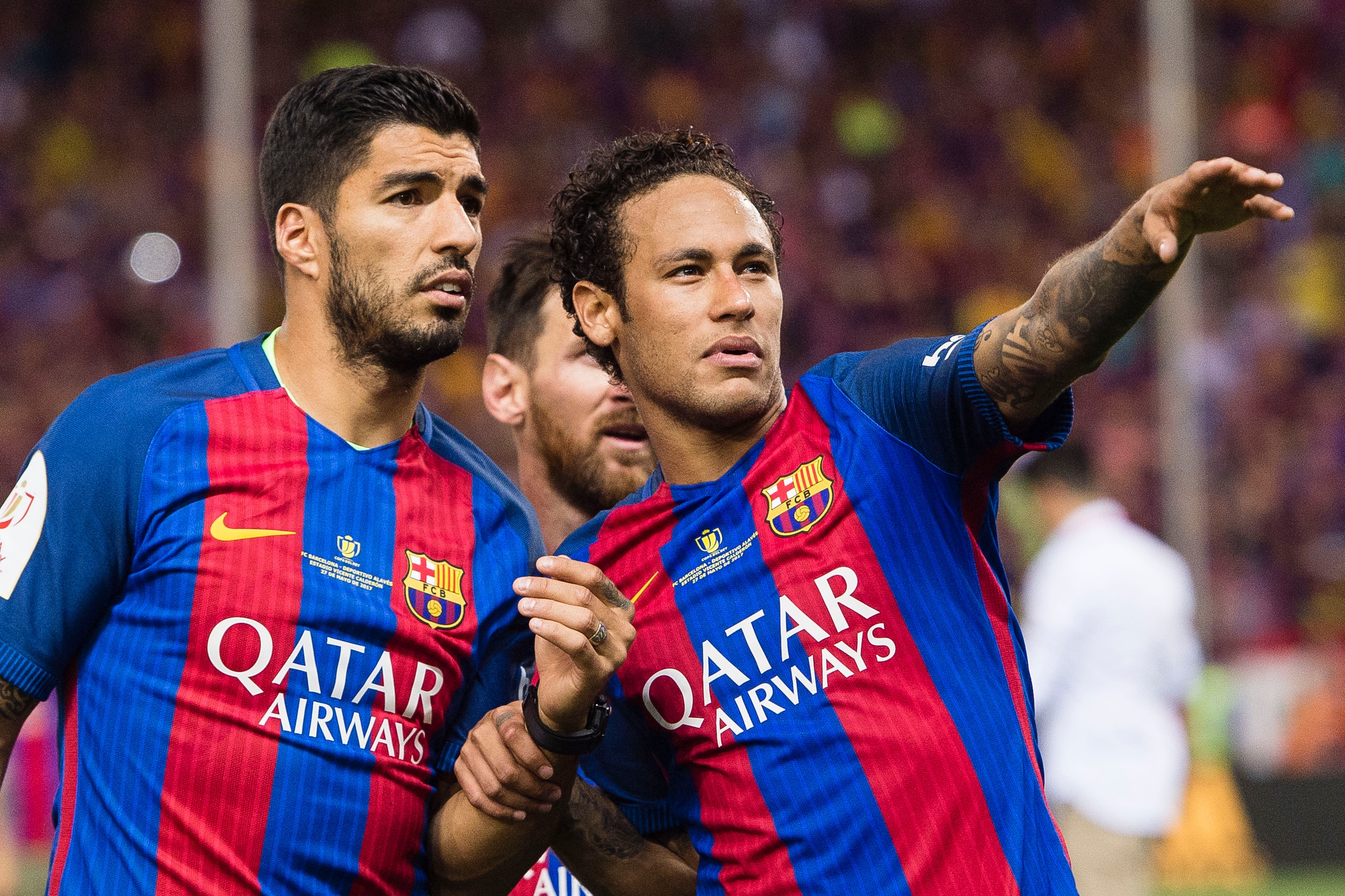 MADRID, SPAIN - MAY 27: Neymar da Silva Santos Junior of FC Barcelona (R) talks to Luis Suarez of FC Barcelona (L) during the Copa Del Rey Final between FC Barcelona and Deportivo Alaves at Vicente Calderon Stadium on May 27, 2017 in Madrid, Spain. (Photo