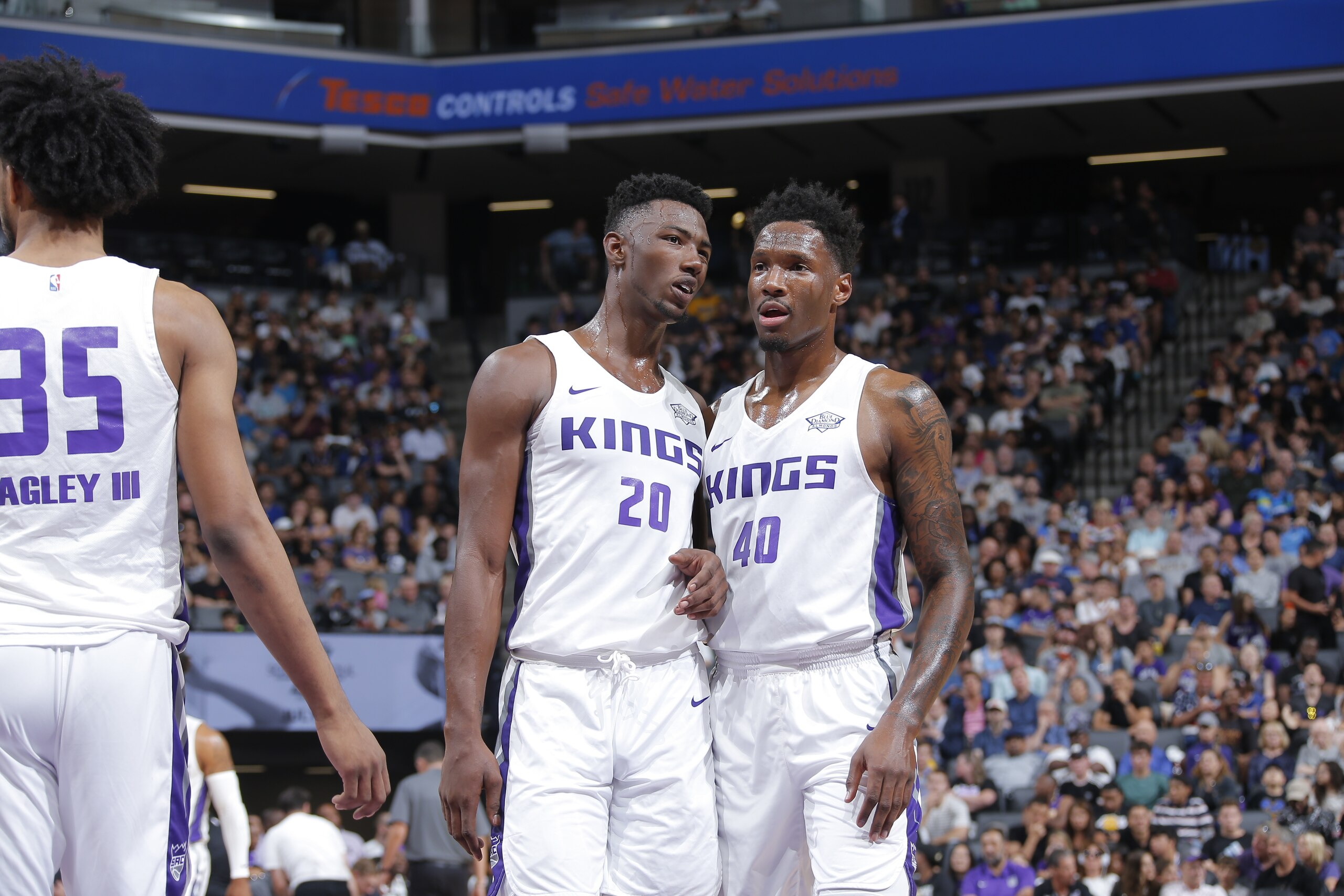 SACRAMENTO, CA - JULY 3: Harry Giles III #20 and Nigel Hayes #40 of the Sacramento Kings speak during the game against the Golden State Warriors on July 3, 2018 at Golden 1 Center in Sacramento, California. NOTE TO USER: User expressly acknowledges and ag