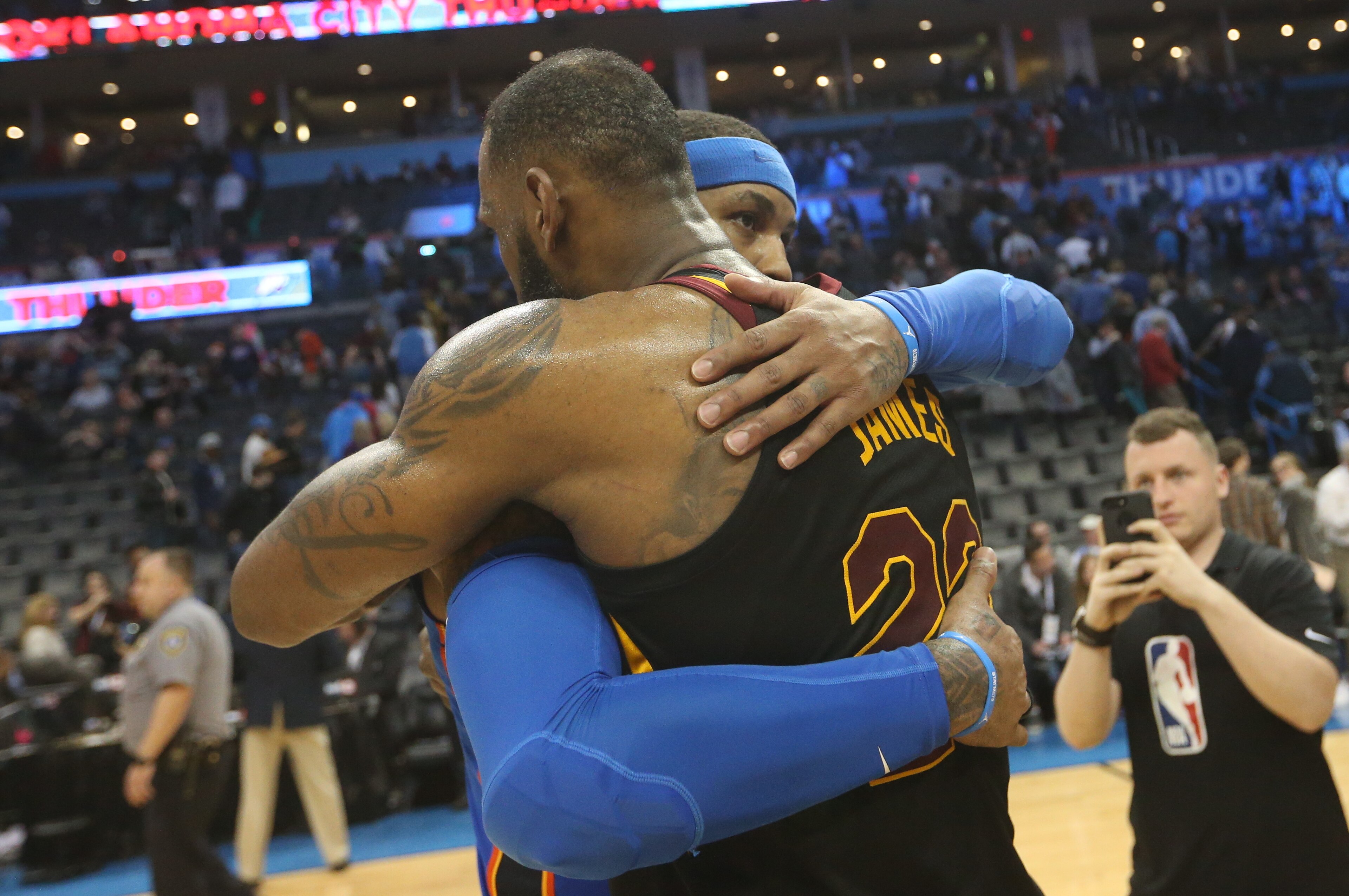 OKLAHOMA CITY, OK - FEBRUARY 13:  LeBron James #23 of the Cleveland Cavaliers and Carmelo Anthony #7 of the Oklahoma City Thunder hug after the game on February 13, 2018 at Chesapeake Energy Arena in Oklahoma City, Oklahoma. NOTE TO USER: User expressly a