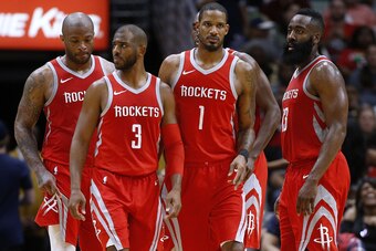 NEW ORLEANS, LA - MARCH 17:  Chris Paul #3 of the Houston Rockets, James Harden #13, Trevor Ariza #1, Luc Mbah a Moute #12 and PJ Tucker #4 talk during the second half against the New Orleans Pelicans at the Smoothie King Center on March 17, 2018 in New O