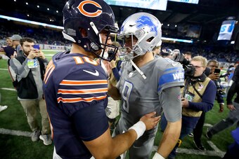 DETROIT, MI - DECEMBER 16:  Detroit Lions quarterback Matthew Stafford #9 talks with Chicago Bears quarterback Mitchell Trubisky #10 after the Lions defeated the Bears20-10 at Ford Field on December 16, 2017 in Detroit, Michigan. (Photo by Gregory Shamus/