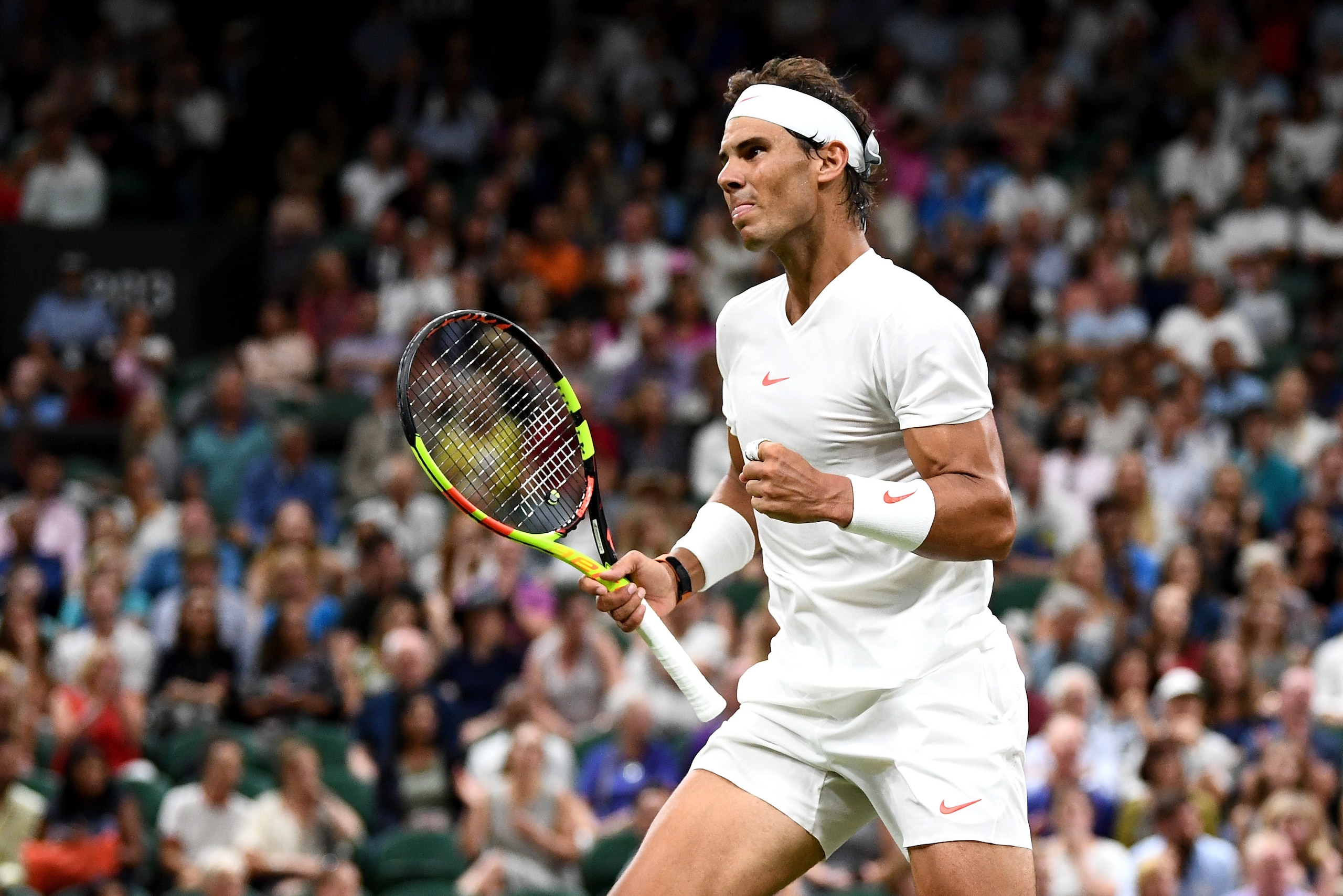 LONDON, ENGLAND - JULY 13: Rafael Nadal of Spain reacts during his Men's Singles semi-final match against Novak Djokovic of Serbia on day eleven of the Wimbledon Lawn Tennis Championships at All England Lawn Tennis and Croquet Club on July 13, 2018 in Lon