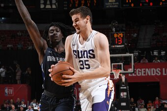 LAS VEGAS, NV - JULY 6:  Dragan Bender #35 of the Phoenix Suns handles the ball against the Dallas Mavericks during the 2018 Las Vegas Summer League on July 6, 2018 at the Thomas & Mack Center in Las Vegas, Nevada. NOTE TO USER: User expressly acknowledge
