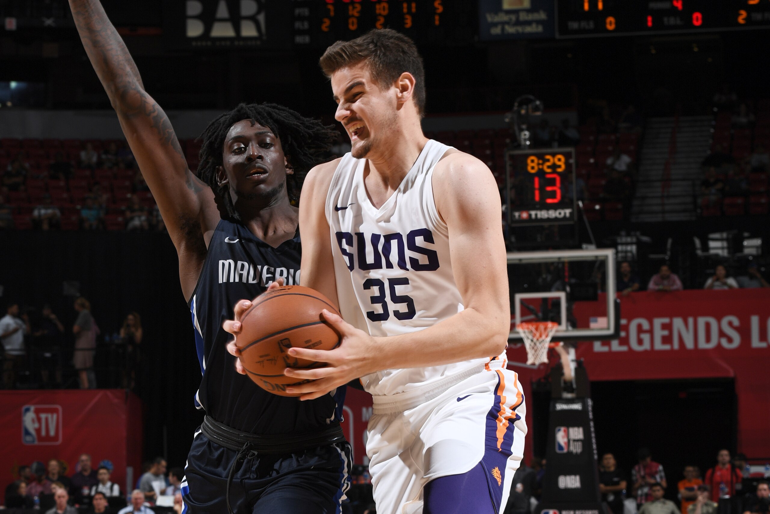 LAS VEGAS, NV - JULY 6:  Dragan Bender #35 of the Phoenix Suns handles the ball against the Dallas Mavericks during the 2018 Las Vegas Summer League on July 6, 2018 at the Thomas & Mack Center in Las Vegas, Nevada. NOTE TO USER: User expressly acknowledge