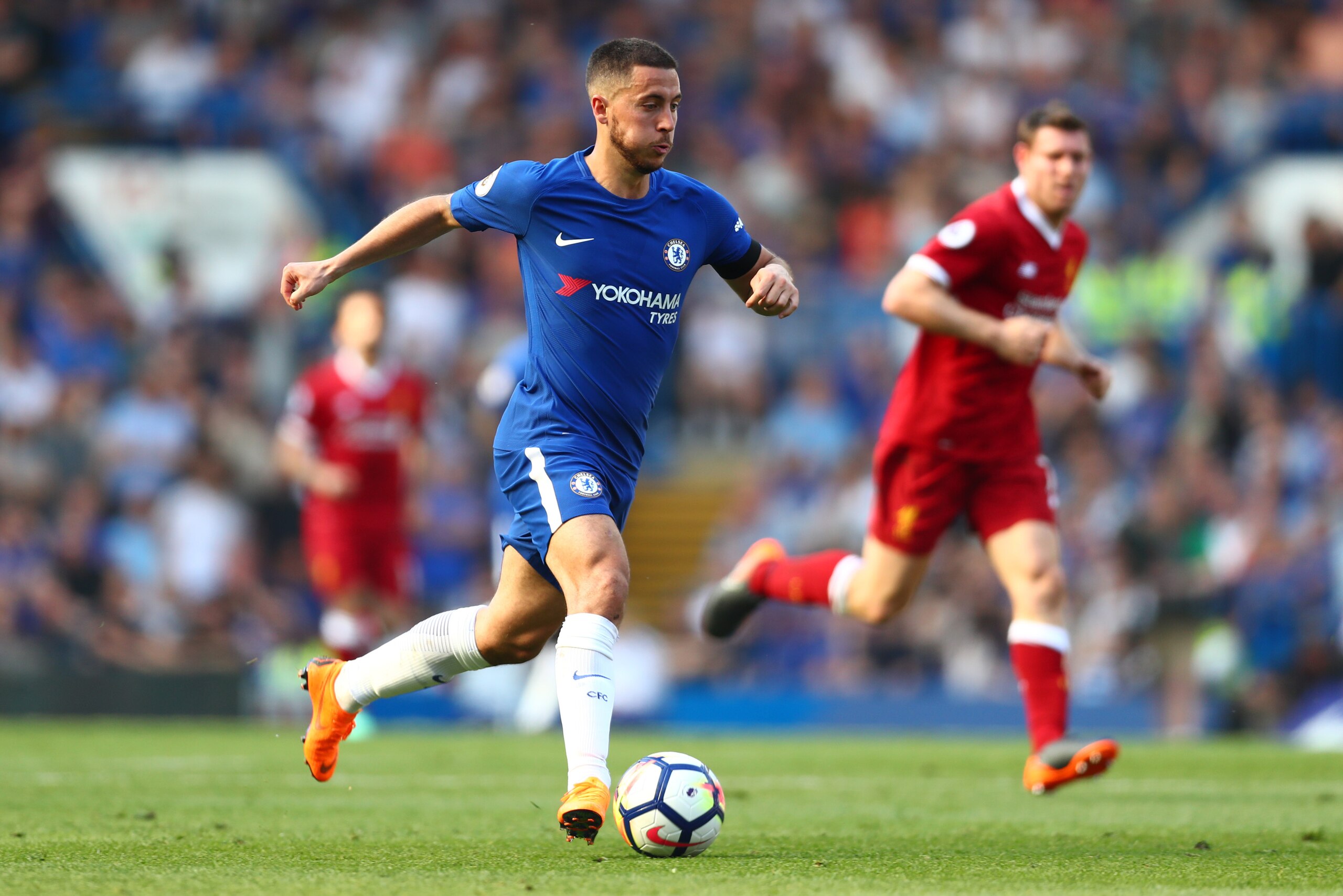 LONDON, ENGLAND - MAY 06: Eden Hazard of Chelsea runs with the ball during the Premier League match between Chelsea and Liverpool at Stamford Bridge on May 6, 2018 in London, England. (Photo by Clive Rose/Getty Images) LONDON, ENGLAND - MAY 06: Eden Hazard of Chelsea runs with the ball during the Premier League match between Chelsea and Liverpool at Stamford Bridge on May 6, 2018 in London, England. (Photo by Clive Rose/Getty Images)