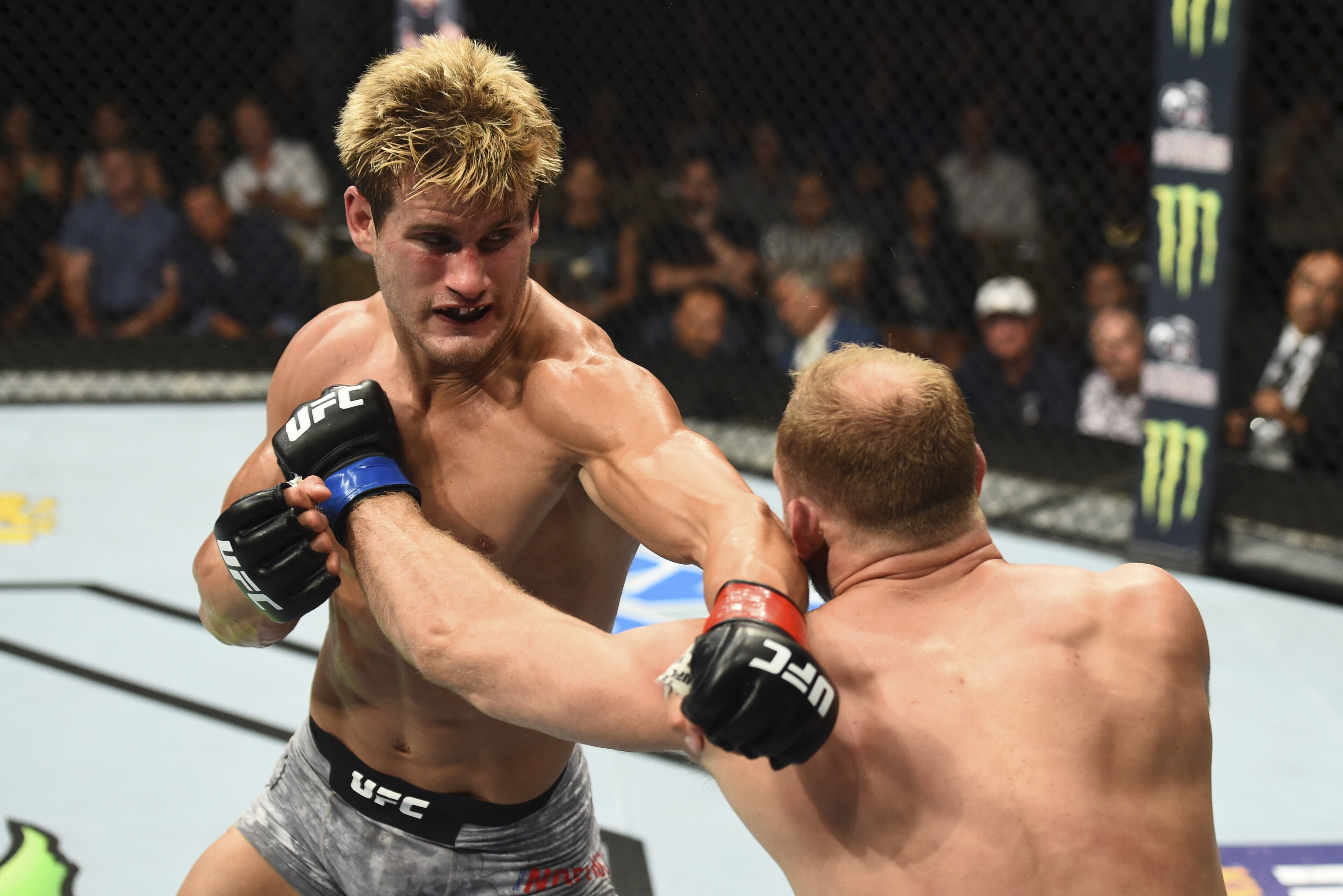 BOISE, ID - JULY 14:  (L-R) Sage Northcutt punches Zak Ottow in their welterweight fight during the UFC Fight Night event inside CenturyLink Arena on July 14, 2018 in Boise, Idaho. (Photo by Josh Hedges/Zuffa LLC/Zuffa LLC via Getty Images)