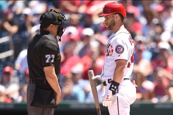 WASHINGTON, DC - JULY 08:  Bryce Harper #34 of the Washington Nationals has words with umpire Jim Reynolds after getting looking on a third strike during a baseball game against the Miami Marlins at Nationals Park on July 8, 2018 in Washington, DC.  (Phot