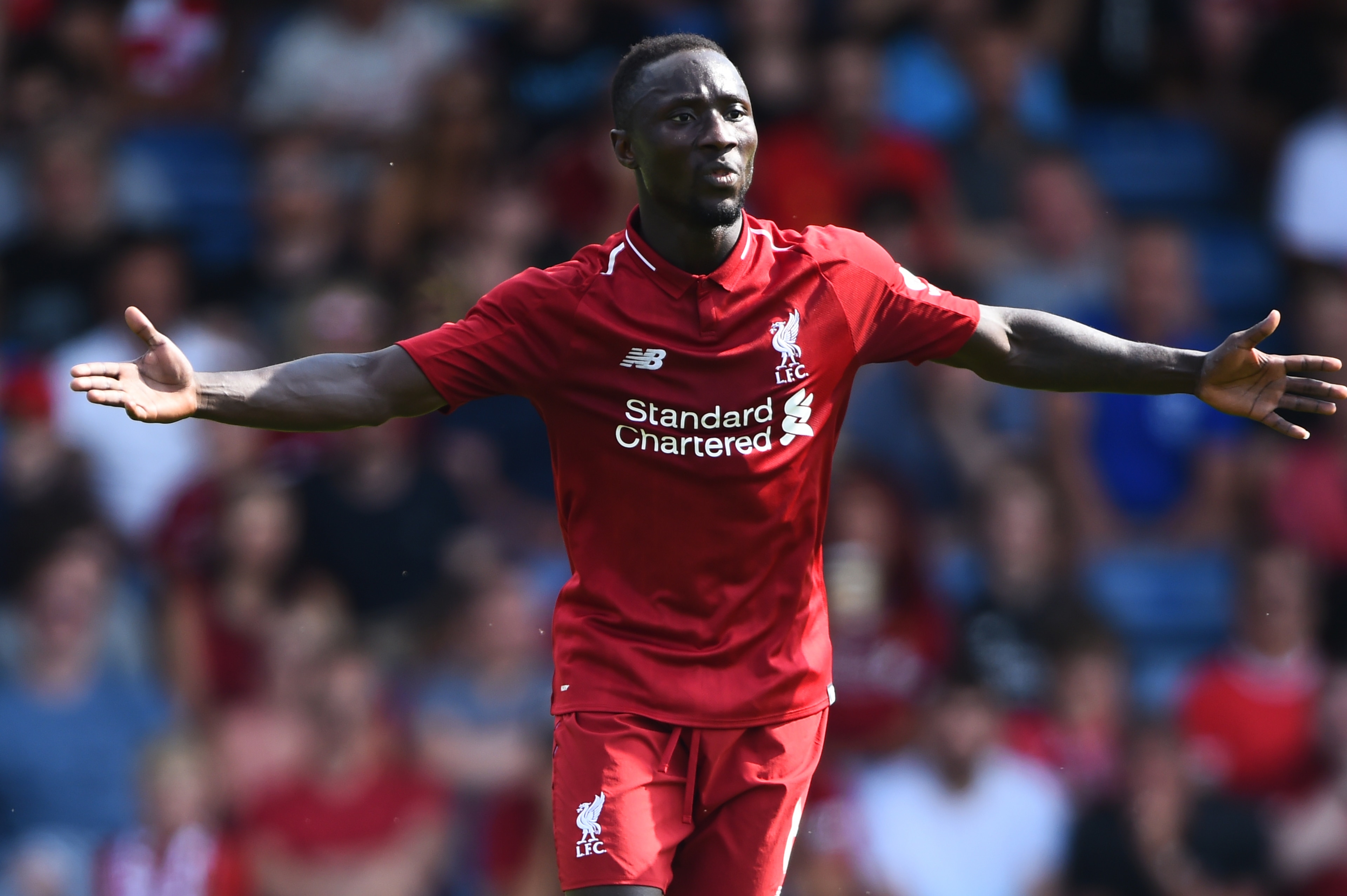 BURY, ENGLAND - JULY 14: Naby Keita of Liverpool reacts during a pre-season friendly match between Bury and Liverpool at Gigg Lane on July 14, 2018 in Bury, England. (Photo by Nathan Stirk/Getty Images)