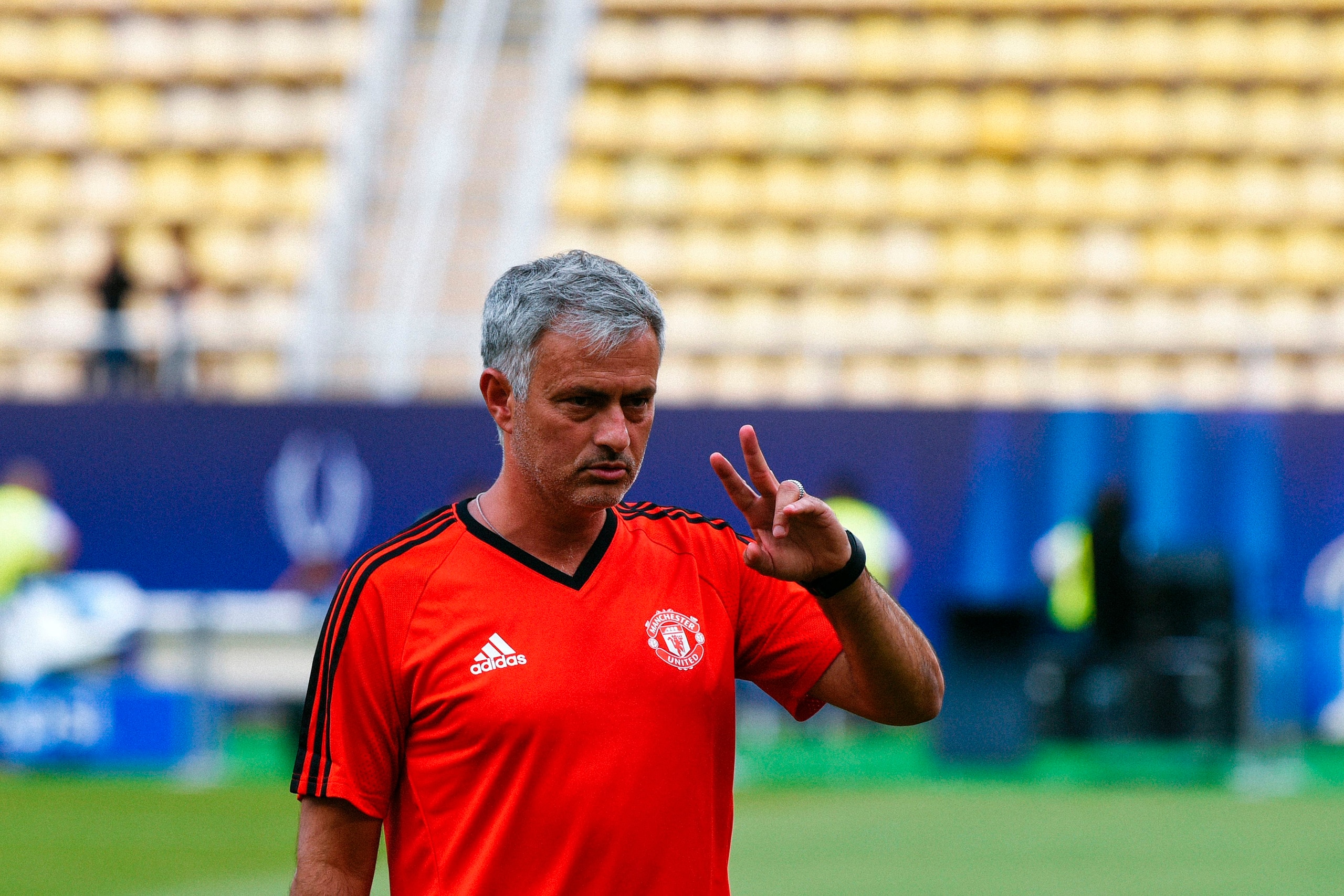 Manchester United's Portuguese coach Jose Mourinho gestures as his players warm up during a training session ahead of the UEFA Super Cup 2017 football match between Real Madrid and Manchester United at The National Arena Filip II in Skopje on August 7, 20