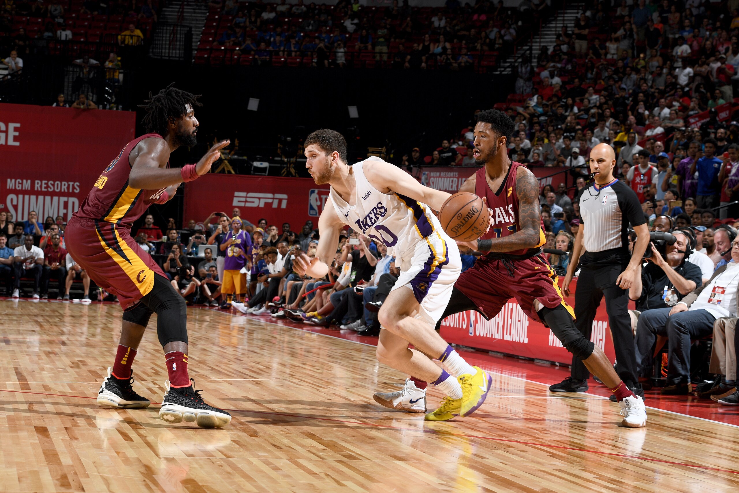 LAS VEAGS, NV - JULY 16: Svi Mykhailiuk #10 of the Los Angeles Lakers handles the ball against the Cleveland Cavaliers during the 2018 Las Vegas Summer League on July 16, 2018 at the Thomas & Mack Center in Las Vegas, Nevada. NOTE TO USER: User expressly 