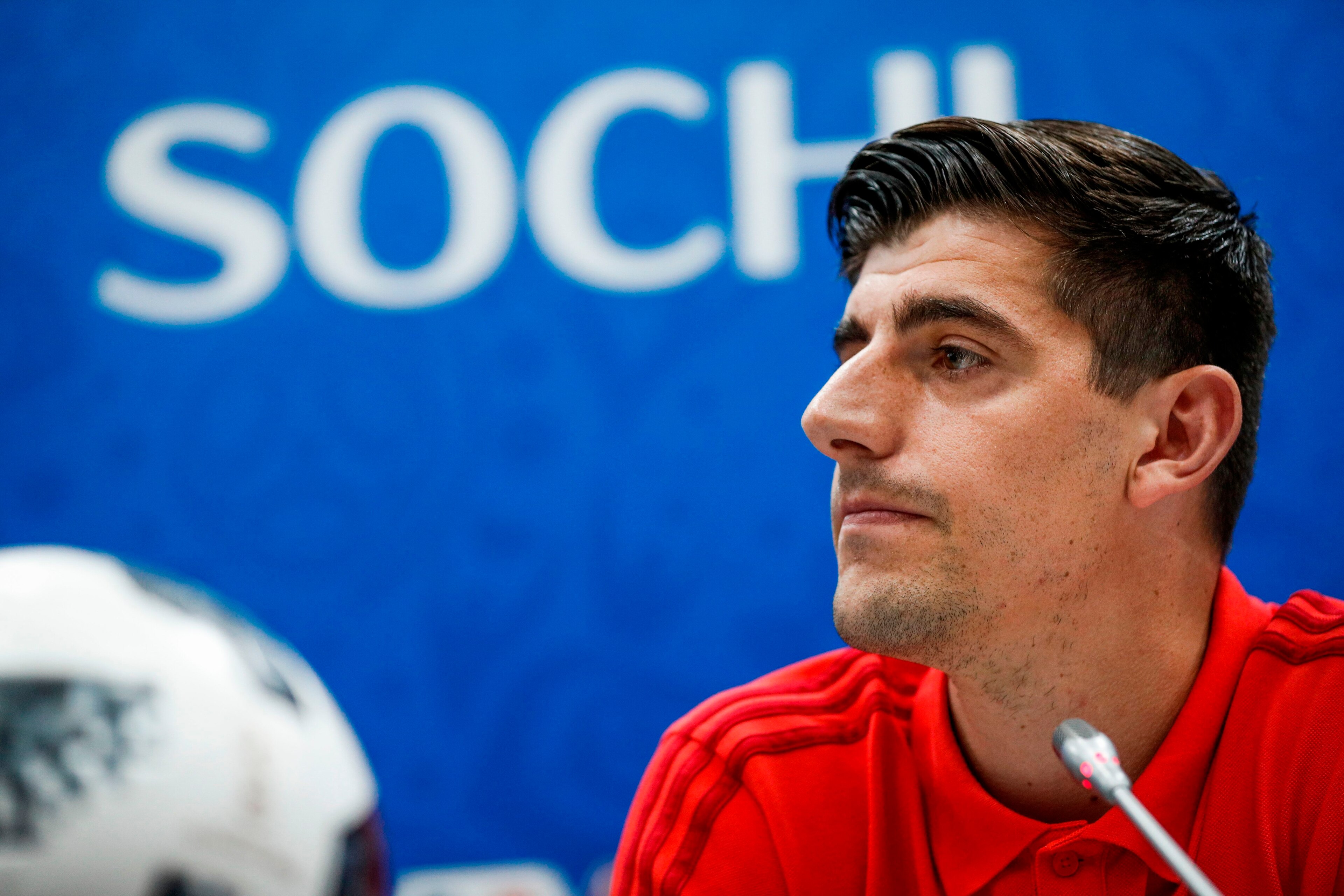 Belgium's goalkeeper Thibaut Courtois (C) attends a press conference at the Fisht Olympic Stadium in Sochi on June 14, 2018, on the eve of the Russia 2018 World Cup Group G football match between Belgium and Panama. (Photo by Adrian DENNIS / AFP)        (