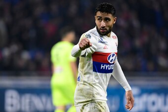 Lyon's French forward Nabil Fekir (R) celebrates after scoring a goal during the French L1 football match between Lyon (OL) and Angers (ASCO) on January 14, 2018, in Decines-Charpieu near Lyon, central-eastern France.  / AFP PHOTO / ROMAIN LAFABREGUE     