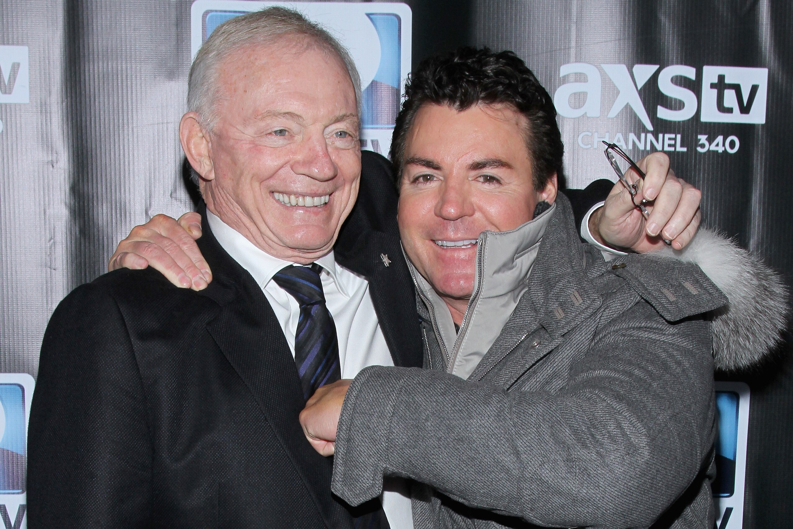 NEW YORK, NY - FEBRUARY 01:  Dallas Cowboys owner Jerry Jones and John Schnatter attend the DirecTV Super Saturday Night at Pier 40 on February 1, 2014 in New York City.  (Photo by Rob Kim/Getty Images for DirecTV)