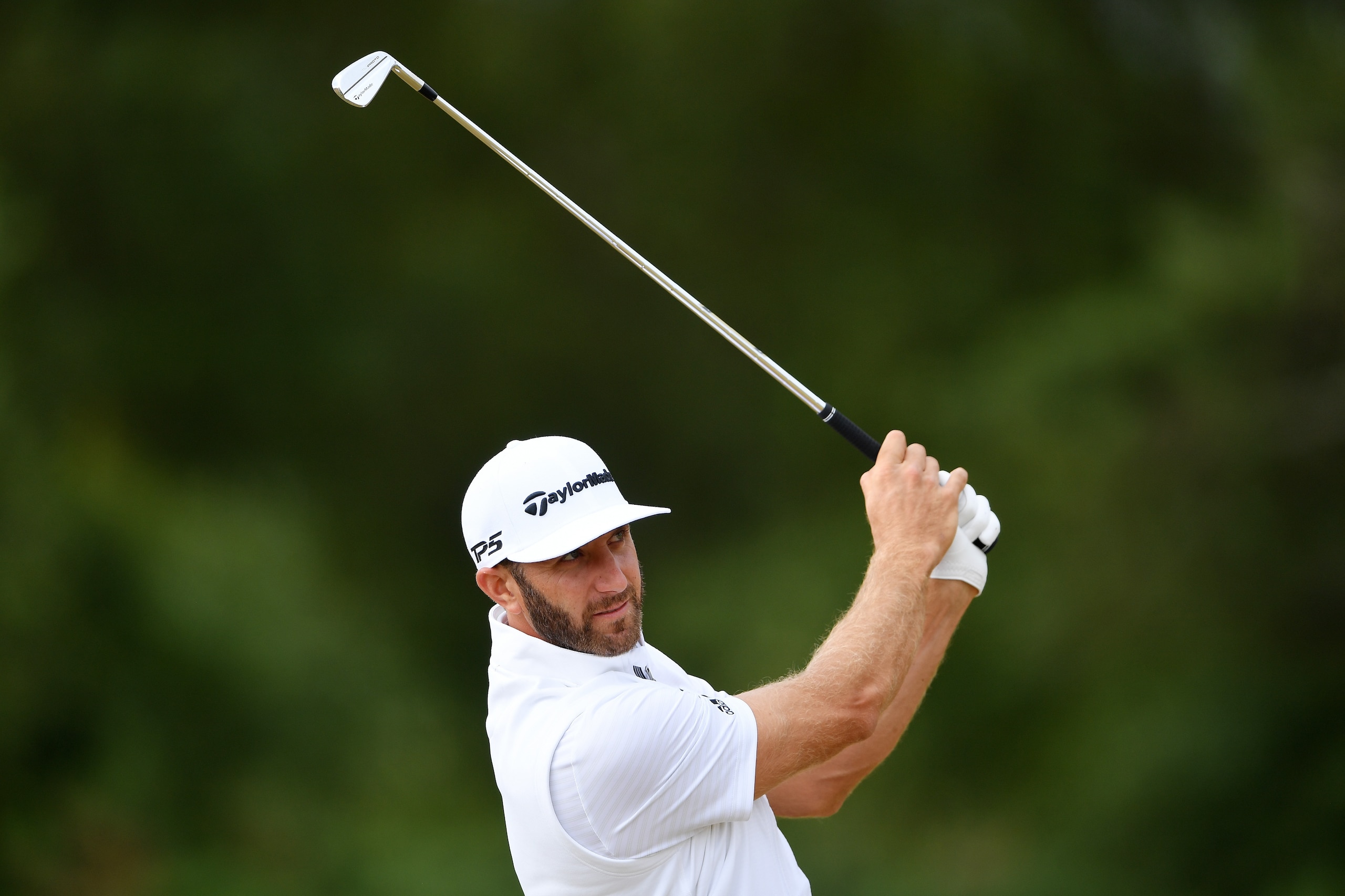 CARNOUSTIE, SCOTLAND - JULY 16:  Dustin Johnson of the United States plays a shot during a practice round prior to the 147th Open Championship at Carnoustie Golf Club on July 16, 2018 in Carnoustie, Scotland.  (Photo by Stuart Franklin/Getty Images)