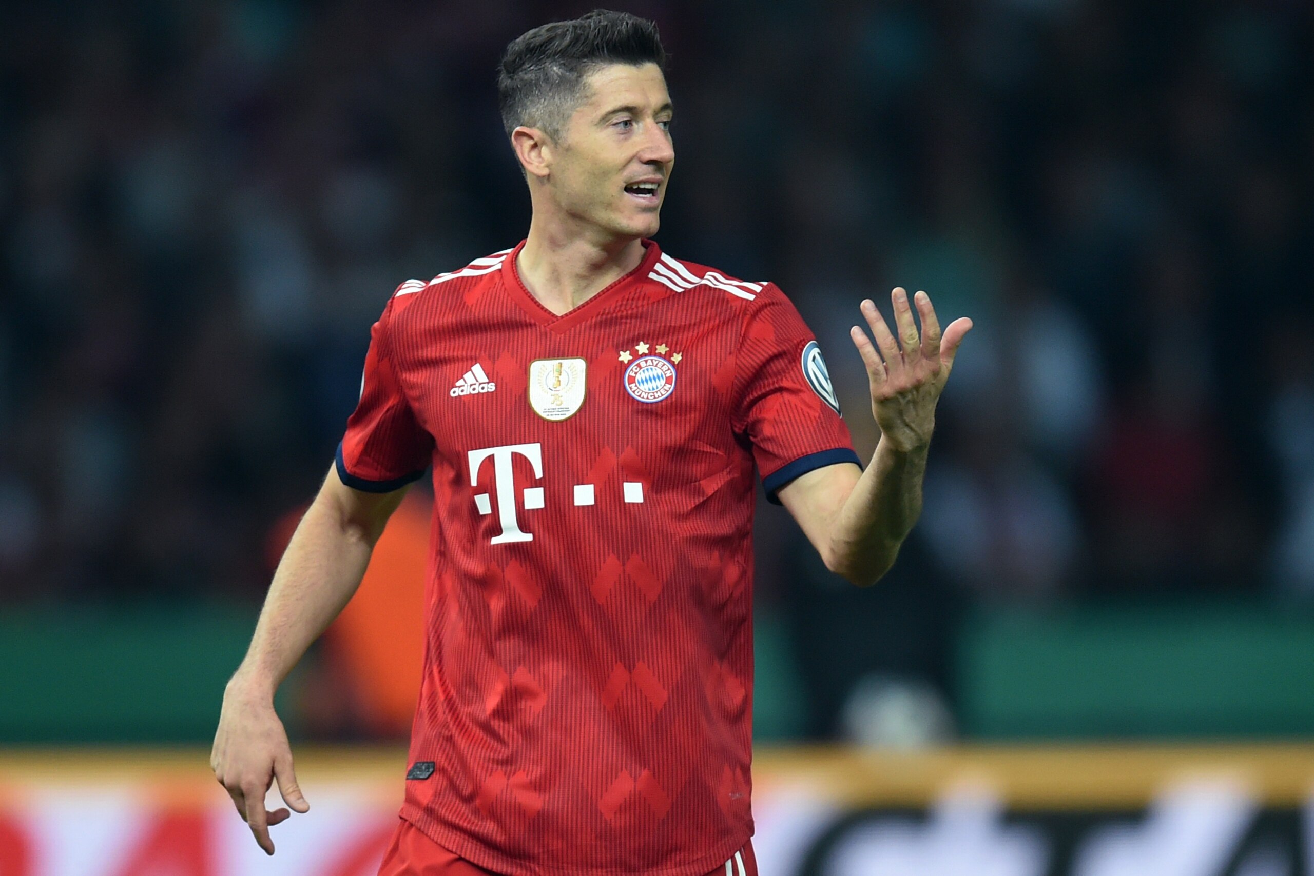 Bayern Munich's Polish striker Robert Lewandowski reacts during the German Cup DFB Pokal final football match FC Bayern Munich vs Eintracht Frankfurt at the Olympic Stadium in Berlin on May 19, 2018. (Photo by Christof STACHE / AFP) / RESTRICTIONS: ACCORD