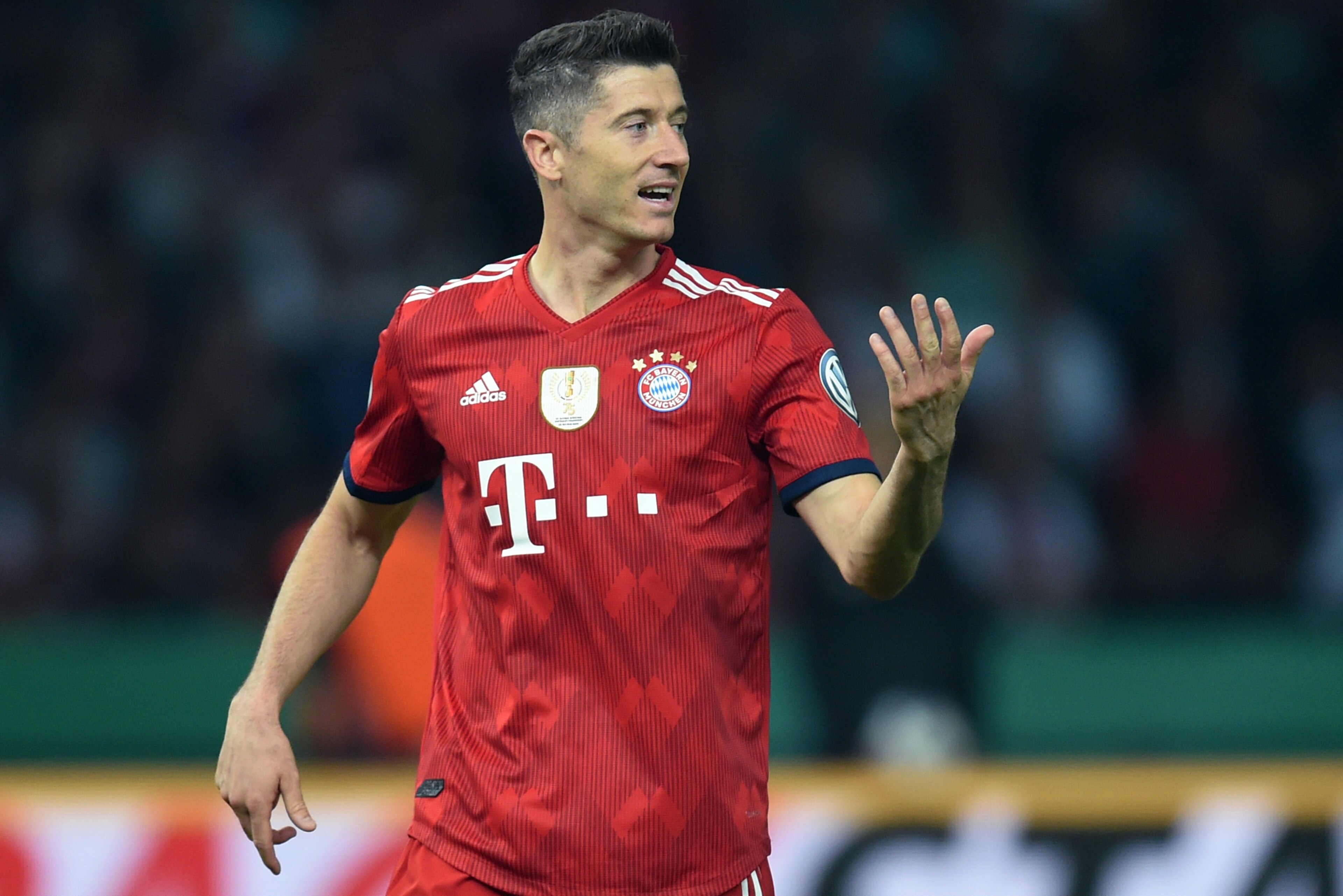 Bayern Munich's Polish striker Robert Lewandowski reacts during the German Cup DFB Pokal final football match FC Bayern Munich vs Eintracht Frankfurt at the Olympic Stadium in Berlin on May 19, 2018. (Photo by Christof STACHE / AFP) / RESTRICTIONS: ACCORD