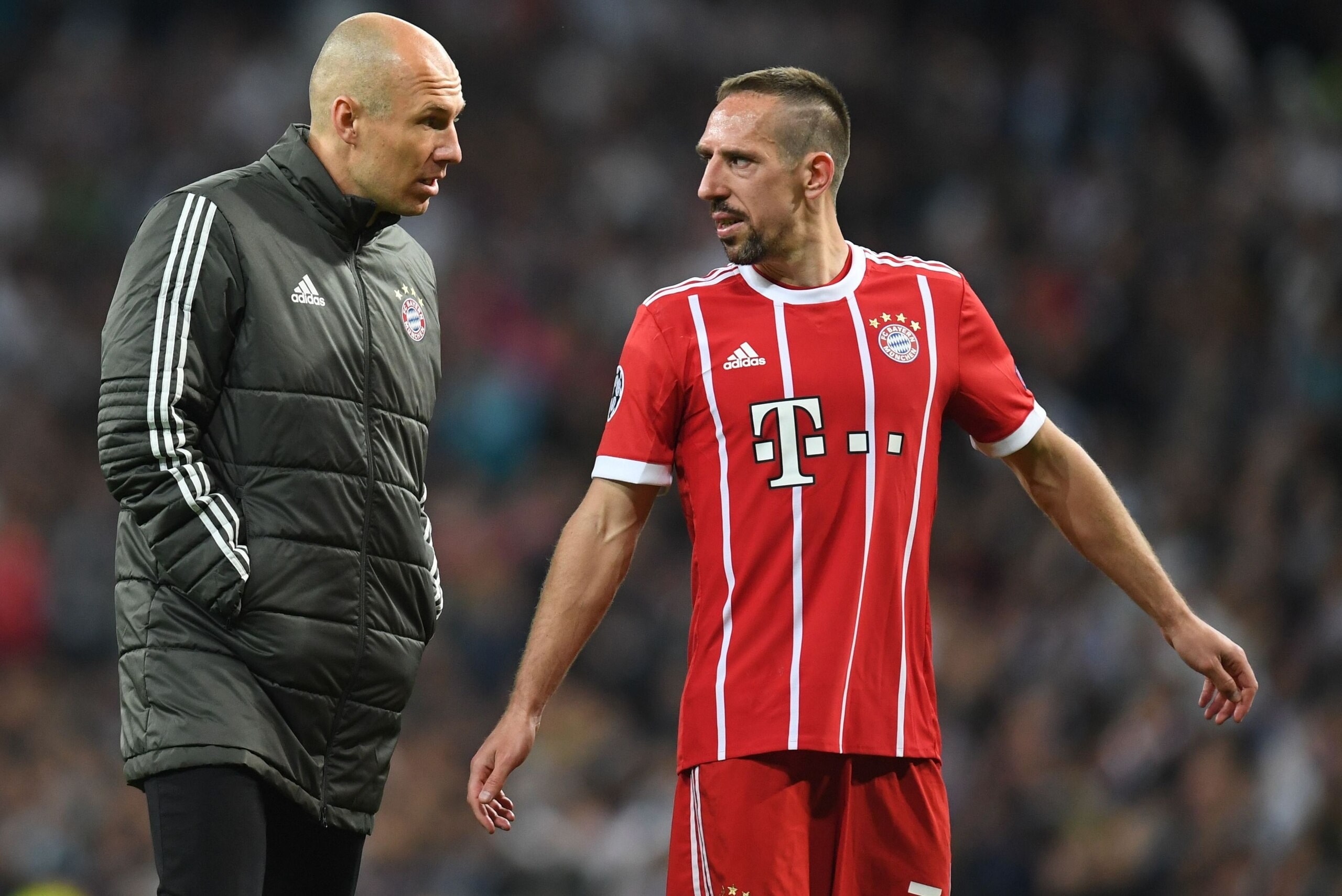 Bayern Munich's Dutch midfielder Arjen Robben (L) and Bayern Munich's French midfielder Franck Ribery react after the UEFA Champions League semi-final second-leg football match Real Madrid CF vs FC Bayern Munich in Madrid, Spain, on May 1, 2018. (Photo by Bayern Munich's Dutch midfielder Arjen Robben (L) and Bayern Munich's French midfielder Franck Ribery react after the UEFA Champions League semi-final second-leg football match Real Madrid CF vs FC Bayern Munich in Madrid, Spain, on May 1, 2018. (Photo by