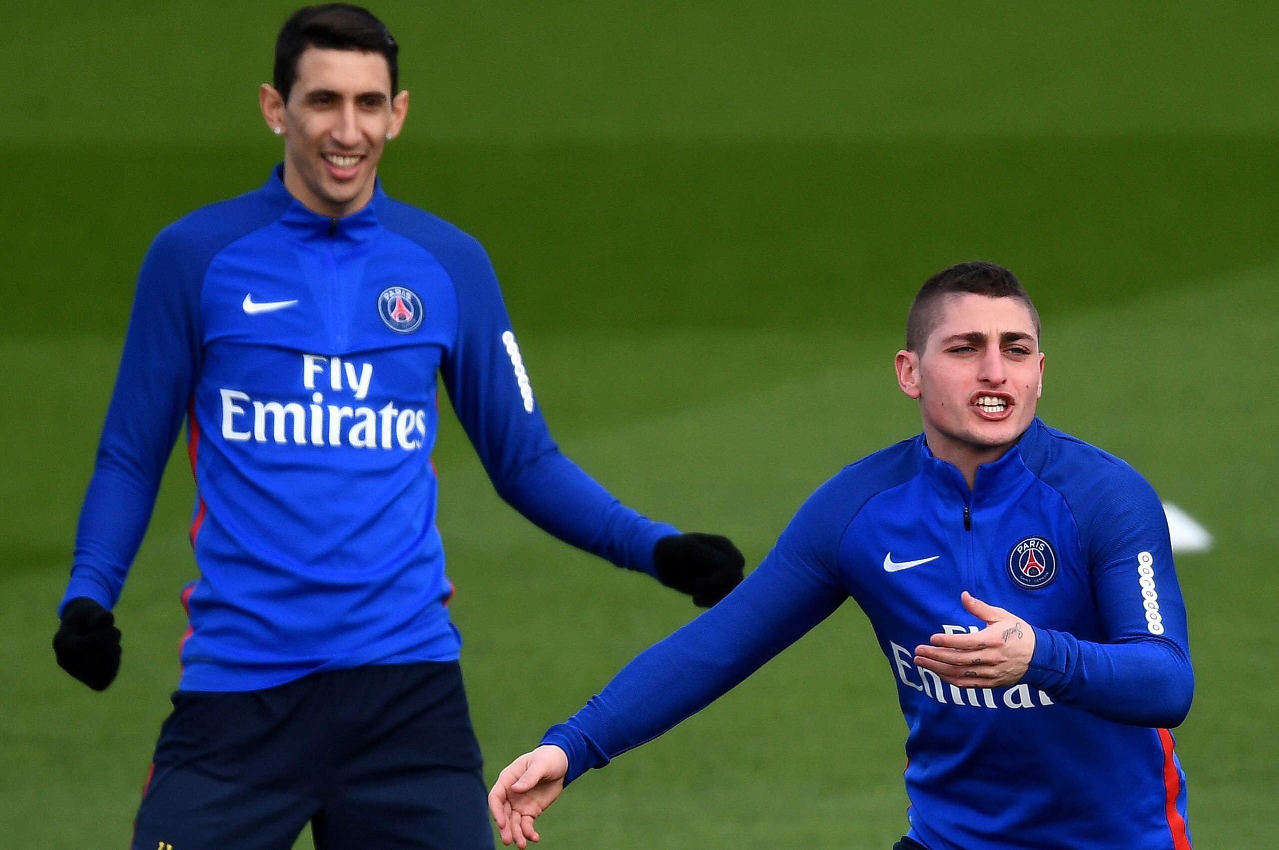 Paris Saint-Germain's Italian midfielder Marco Verratti (R) reacts next to Paris Saint-Germain's Argentinian forward Angel Di Maria during a training session at Saint-Germain-en-Laye, western Paris on March 16, 2018, two days before the French L1 football Paris Saint-Germain's Italian midfielder Marco Verratti (R) reacts next to Paris Saint-Germain's Argentinian forward Angel Di Maria during a training session at Saint-Germain-en-Laye, western Paris on March 16, 2018, two days before the French L1 football