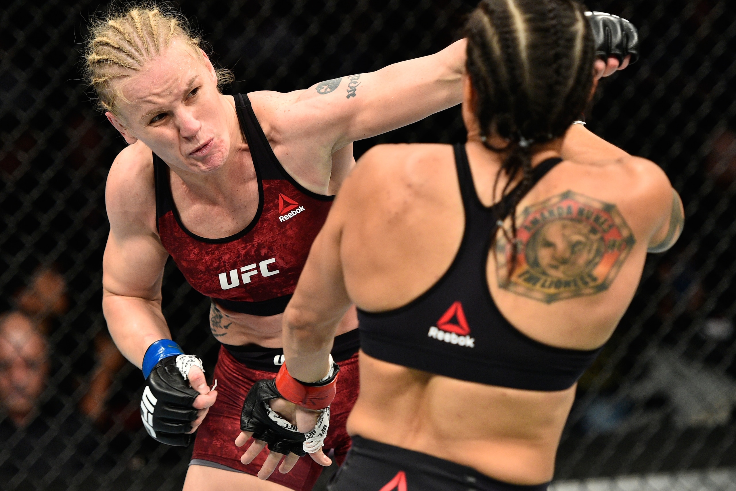 EDMONTON, AB - SEPTEMBER 09:  (L-R) Valentina Shevchenko of Kyrgyzstan punches Amanda Nunes of Brazil in their women's bantamweight bout during the UFC 215 event inside the Rogers Place on September 9, 2017 in Edmonton, Alberta, Canada. (Photo by Jeff Bot